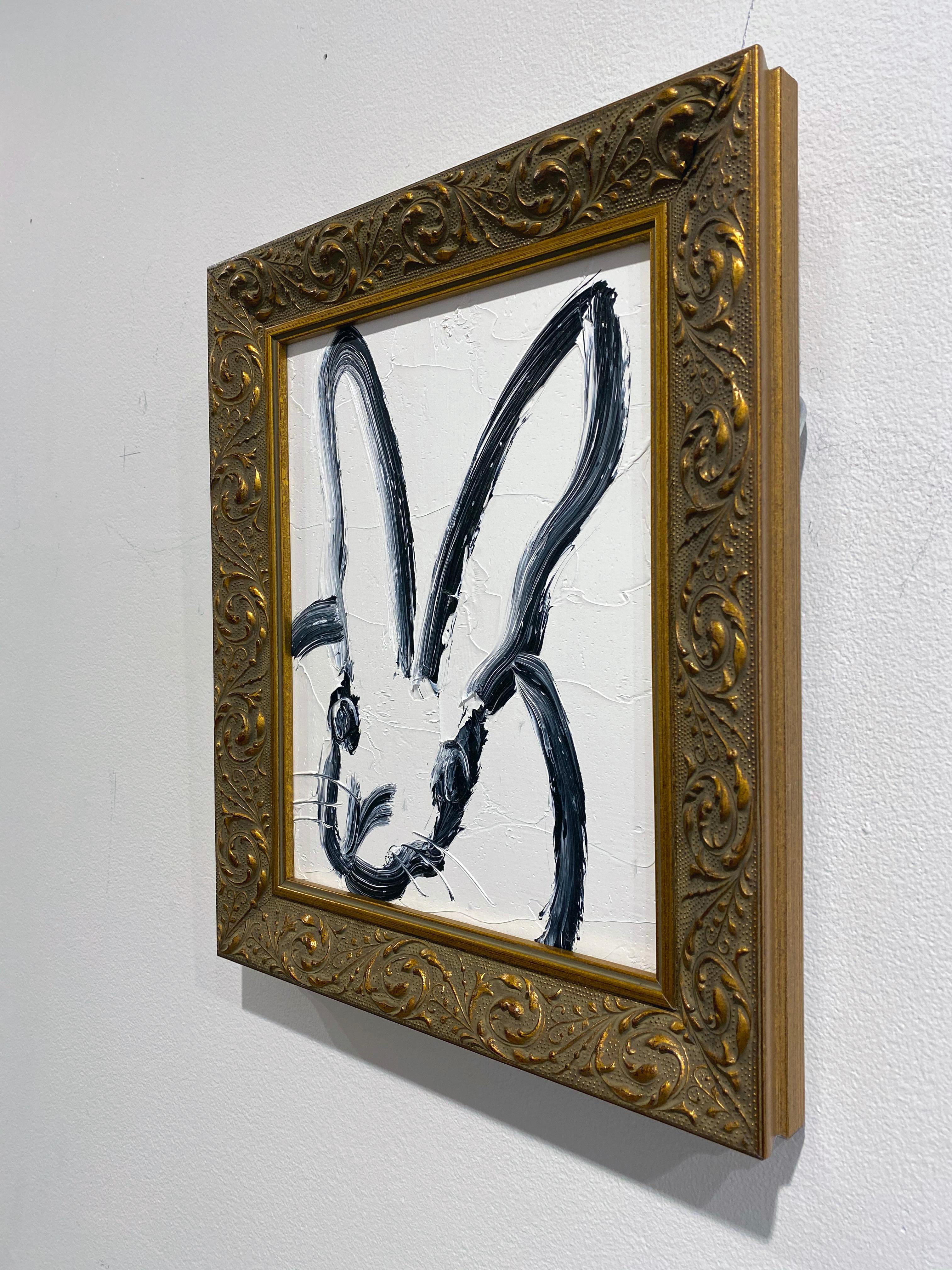 'Untitled' by Hunt Slonem, 2020. Oil on wood, 10 x 8 in. Framed size is 13 x 10.5 in. This painting features Slonem's signature bunny outlined in black on a bright white background. Framed in a decorative gold frame.

Considered one of the great