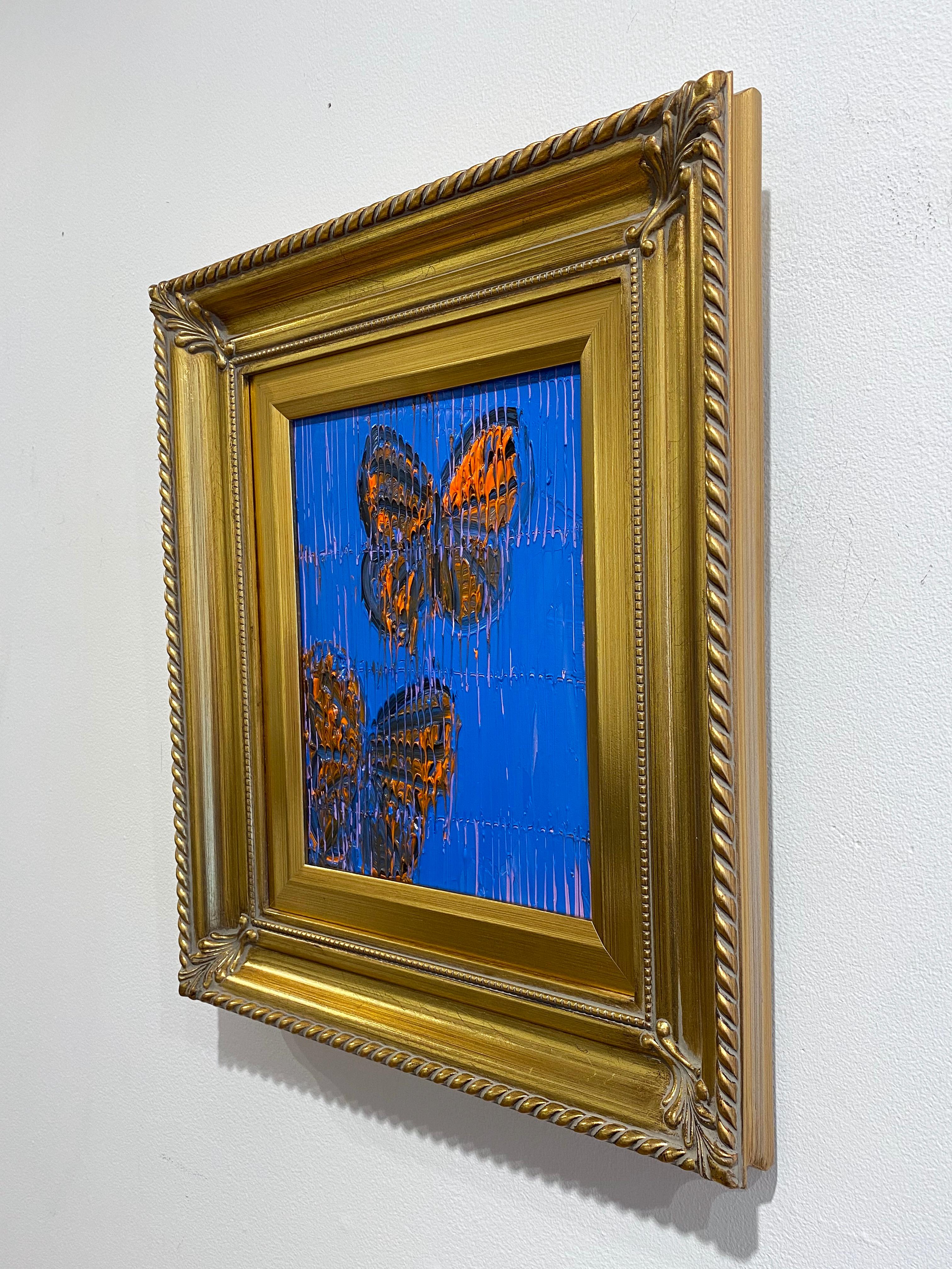 'Monarchs' by Hunt Slonem, 2020. Oil on wood, 10 x 8 in. Framed size is 16 x 14 in. This painting features a charming portrait of two Monarch butterflies. The butterflies are painted in orange and black on a deep blue background with a cross-hatch