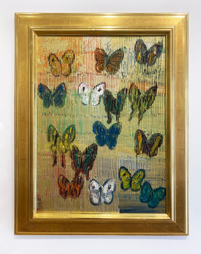 'Soar I' 2021 by renowned New York City artist, Hunt Slonem. Oil on wood, 30 x 22 in. Framed dimmension is 37.5 x 29 in. This painting features a charming portrait of colorful butterflies. The butterflies are painted in a palette of colors of