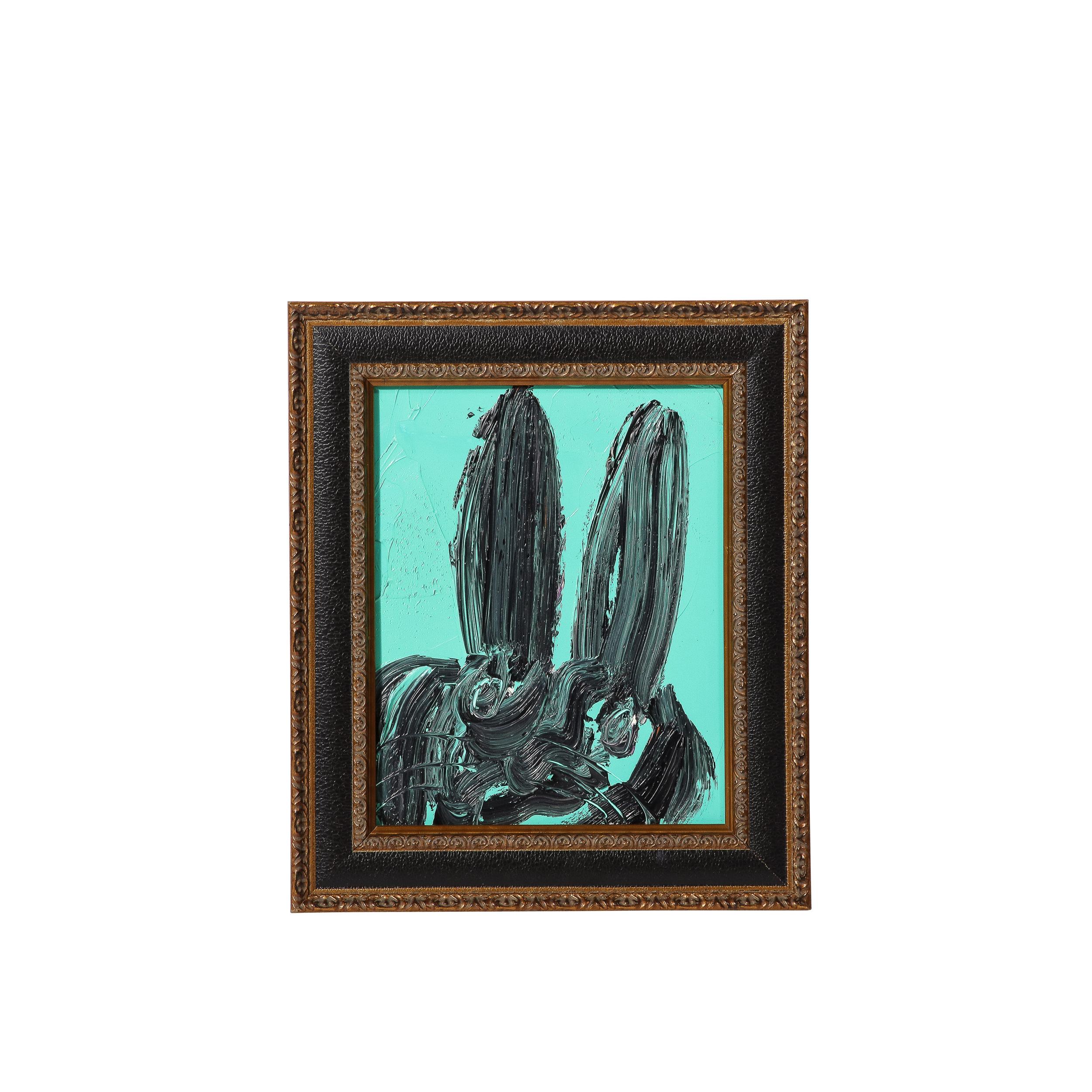 This whimsical and sophisticated painting was realized by the esteemed contemporary painter, Hunt Slonem in 2017. Featuring a stunning background hue in a high chroma blue green, this near brutalist rabbit is deftly rendered in thick and vigorous