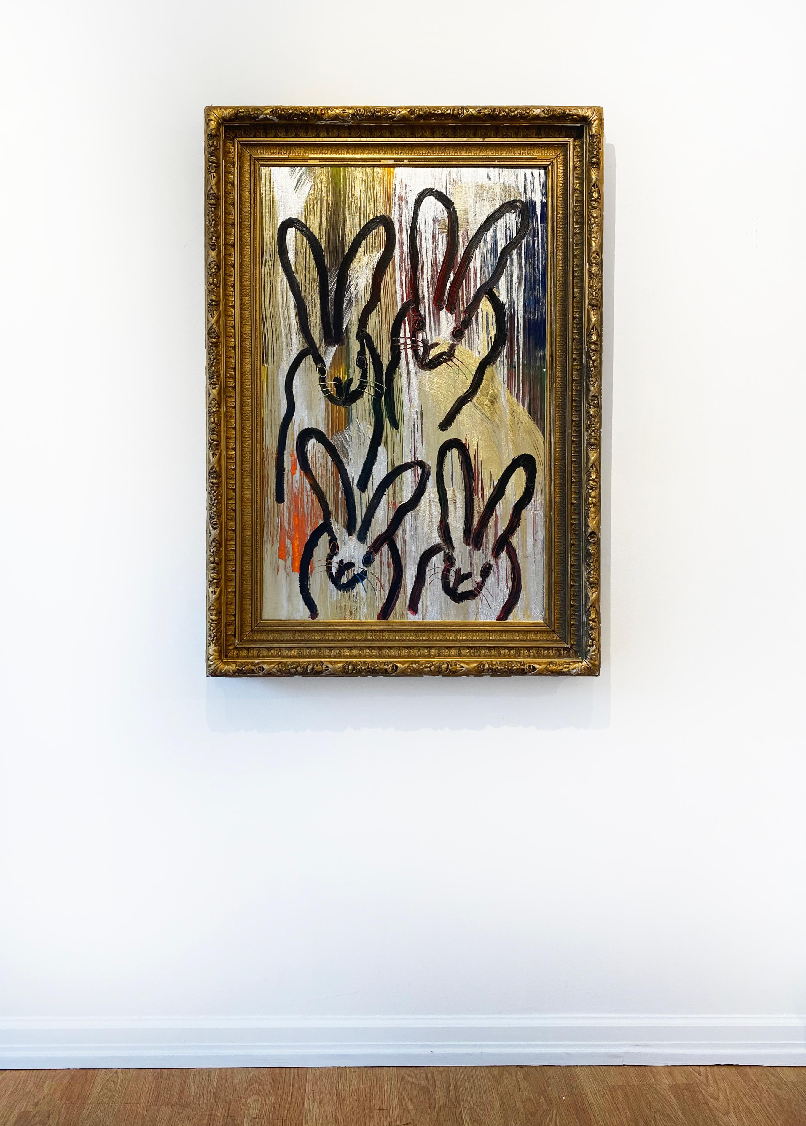 '4+' by Hunt Slonem, 2022. Oil on canvas, 39 x 25 in./ frame: 47.5 x 33.5 in. This painting features Slonem's signature bunnies outlined in black over strokes of gold, silver, red, blue, orange, and yellow. Framed in an antique, gold