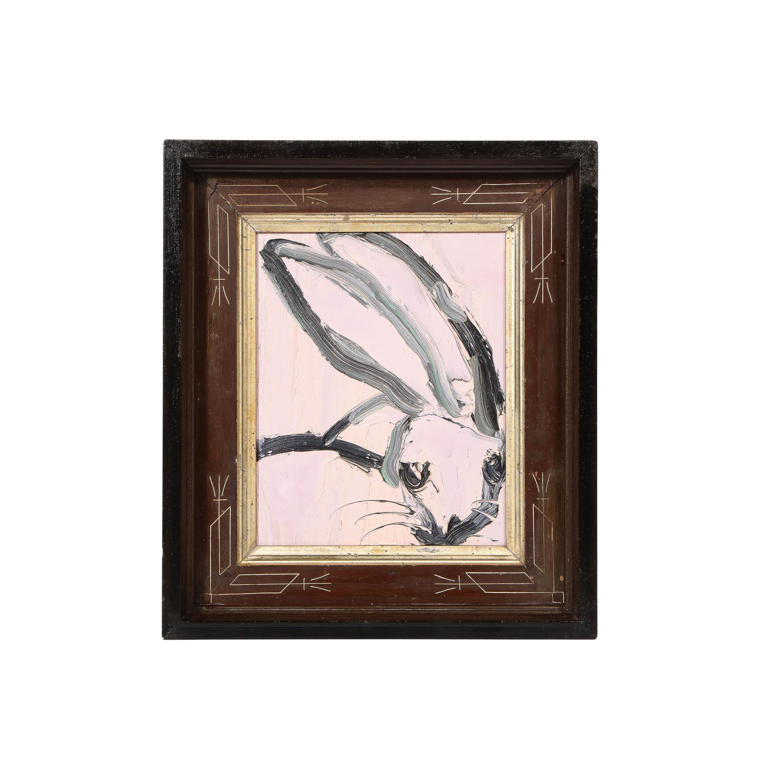 This elegant and whimsical painting was realized by the esteemed contemporary painter, Hunt Slonem in 2015. It presents a stylized bunny rabbit, rendered with loose and expressive brush strokes in black paint against a light gum pink background.