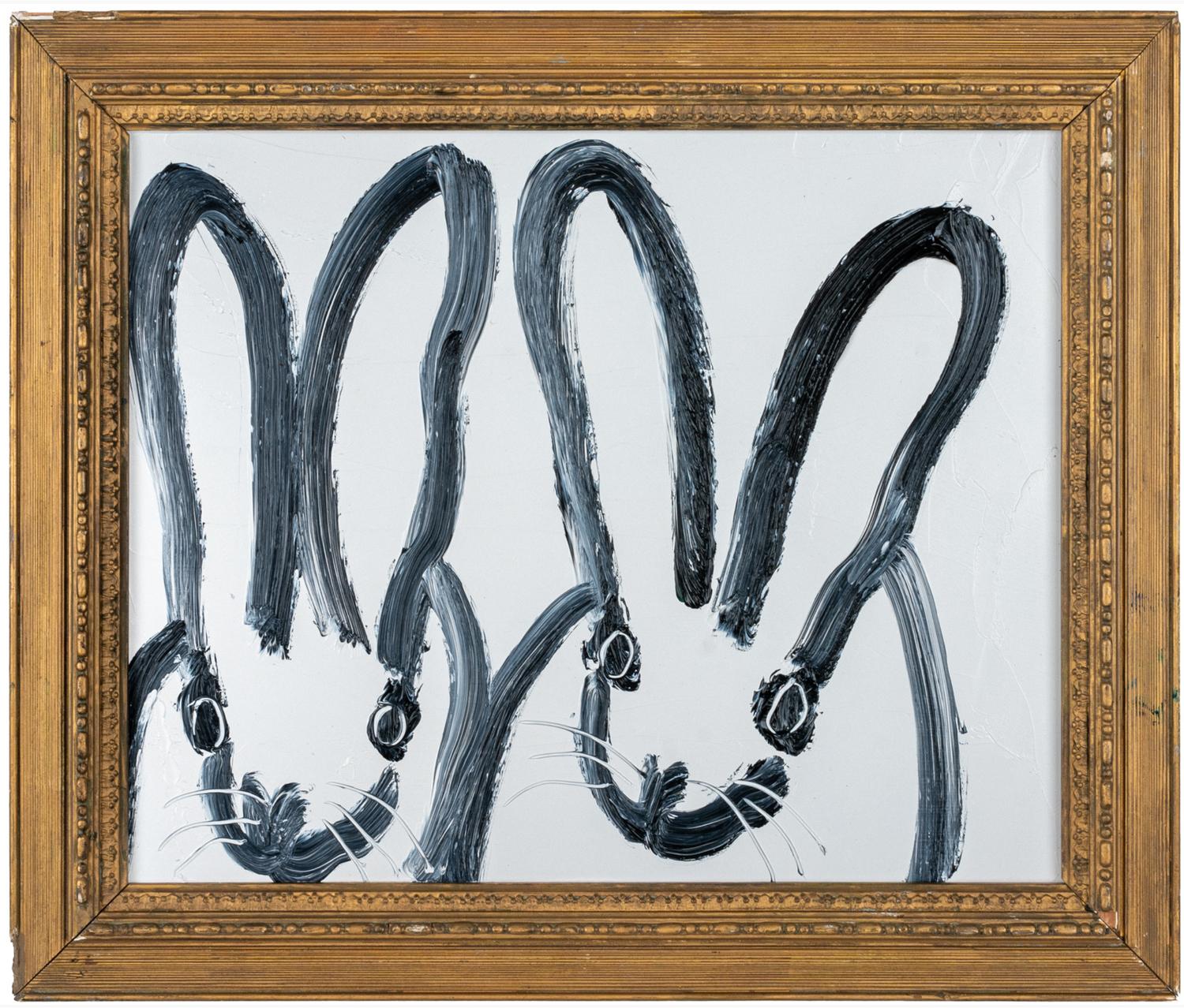 Renowned artist Hunt Slonem's "Double Bunny" is a 13.5 x 16 black and white oil painting on wood board of contemporary abstract bunnies. 

*Painting is framed - Please note that not all Hunt Slonem frames are in mint condition. There may be signs of