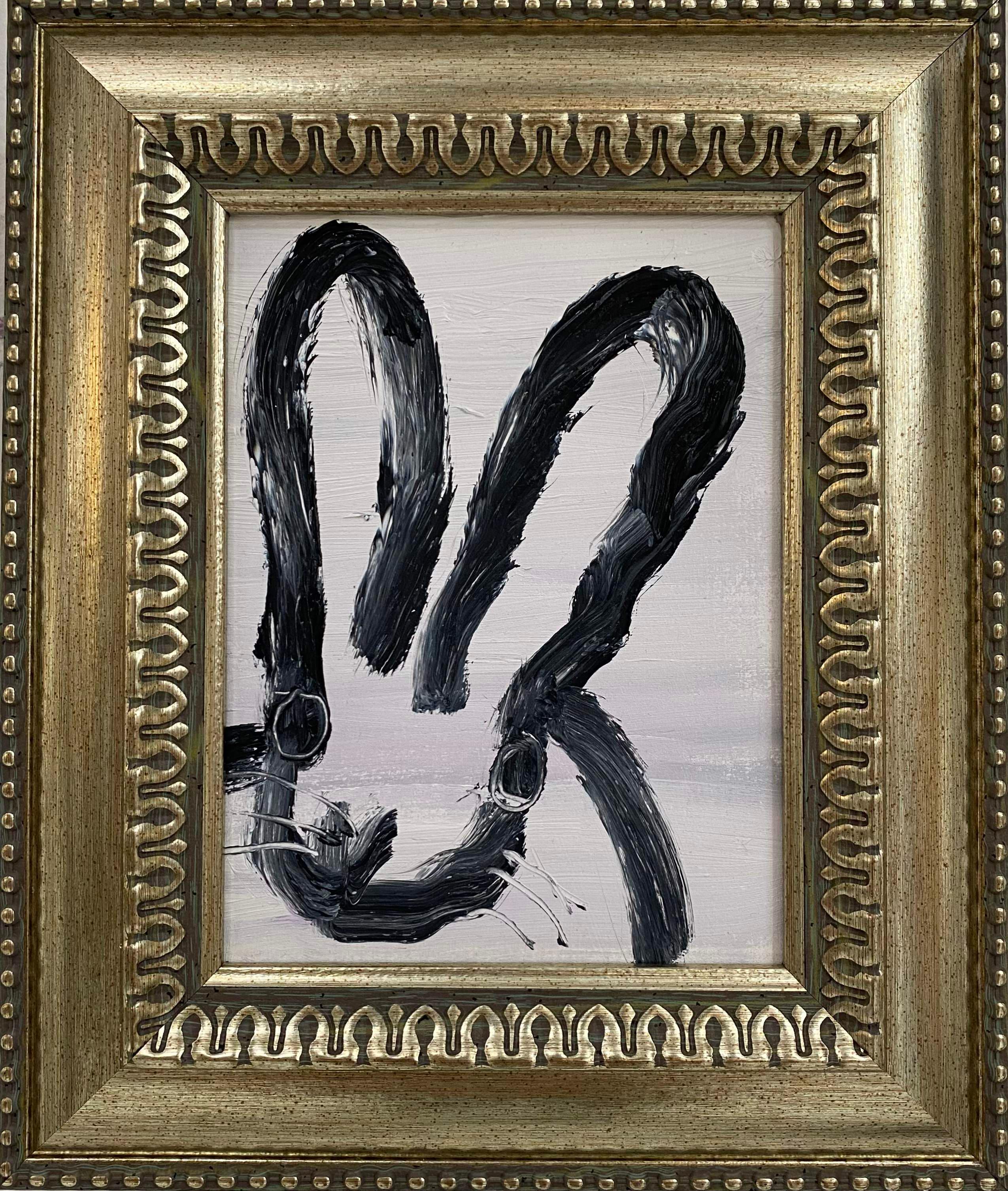 Hunt Slonem "Happy Camper" Black and White Bunny
A single rabbit gestured in black on a white and grey background in a vintage frame

Unframed: 8 x 6 inches
Framed: 12.5 x 10.5 inches
*Painting is framed - Please note Hunt Slonem paintings with