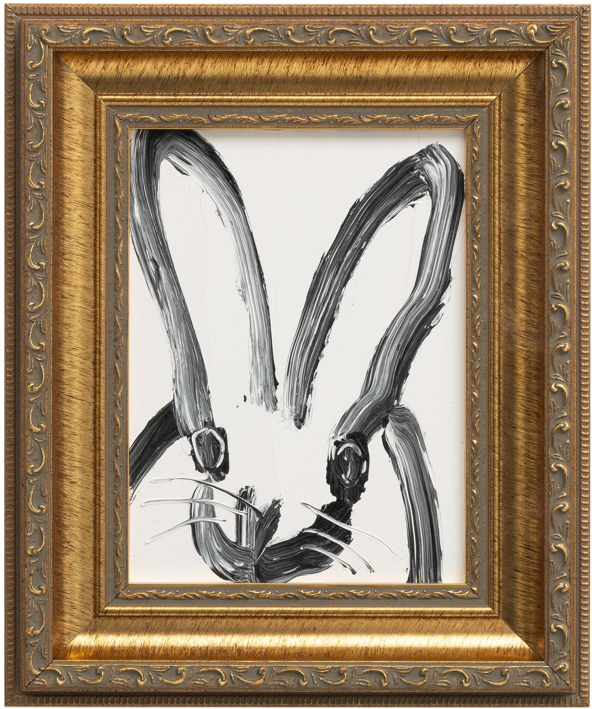 Hunt Slonem "Jamie" Black and White Bunny
A single rabbit gestured in black on a white background in a vintage frame

Unframed: 7.5 x 5.5 inches
Framed: 11.5 x 9.5 inches
*Painting is framed - Please note Hunt Slonem paintings with frames may show