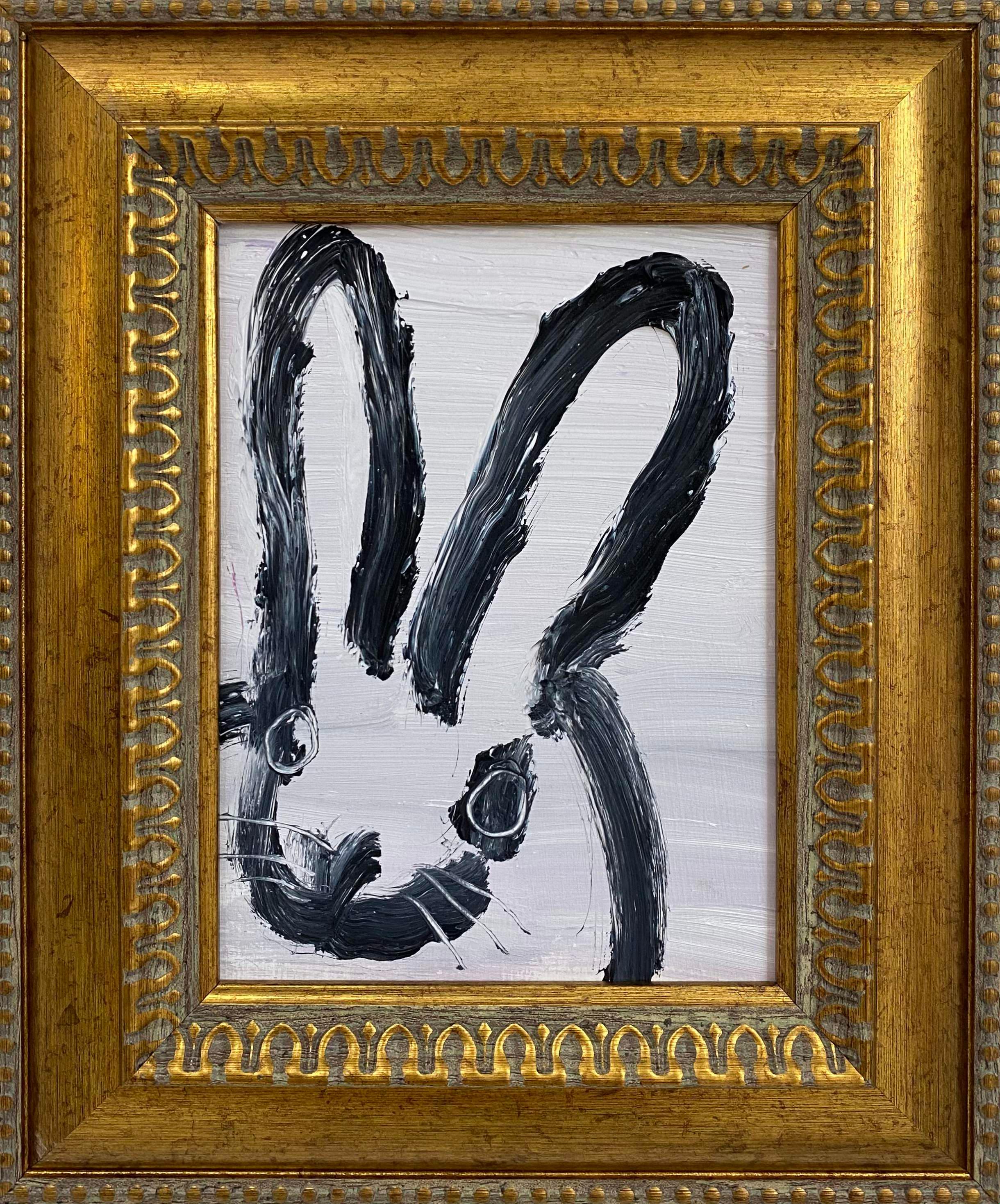 Hunt Slonem "Joy" Black and White Bunny
A single rabbit gestured in black on a white background in a vintage frame

Unframed: 8 x 6 inches
Framed: 12.5 x 10.5 inches
*Painting is framed - Please note Hunt Slonem paintings with frames may show signs