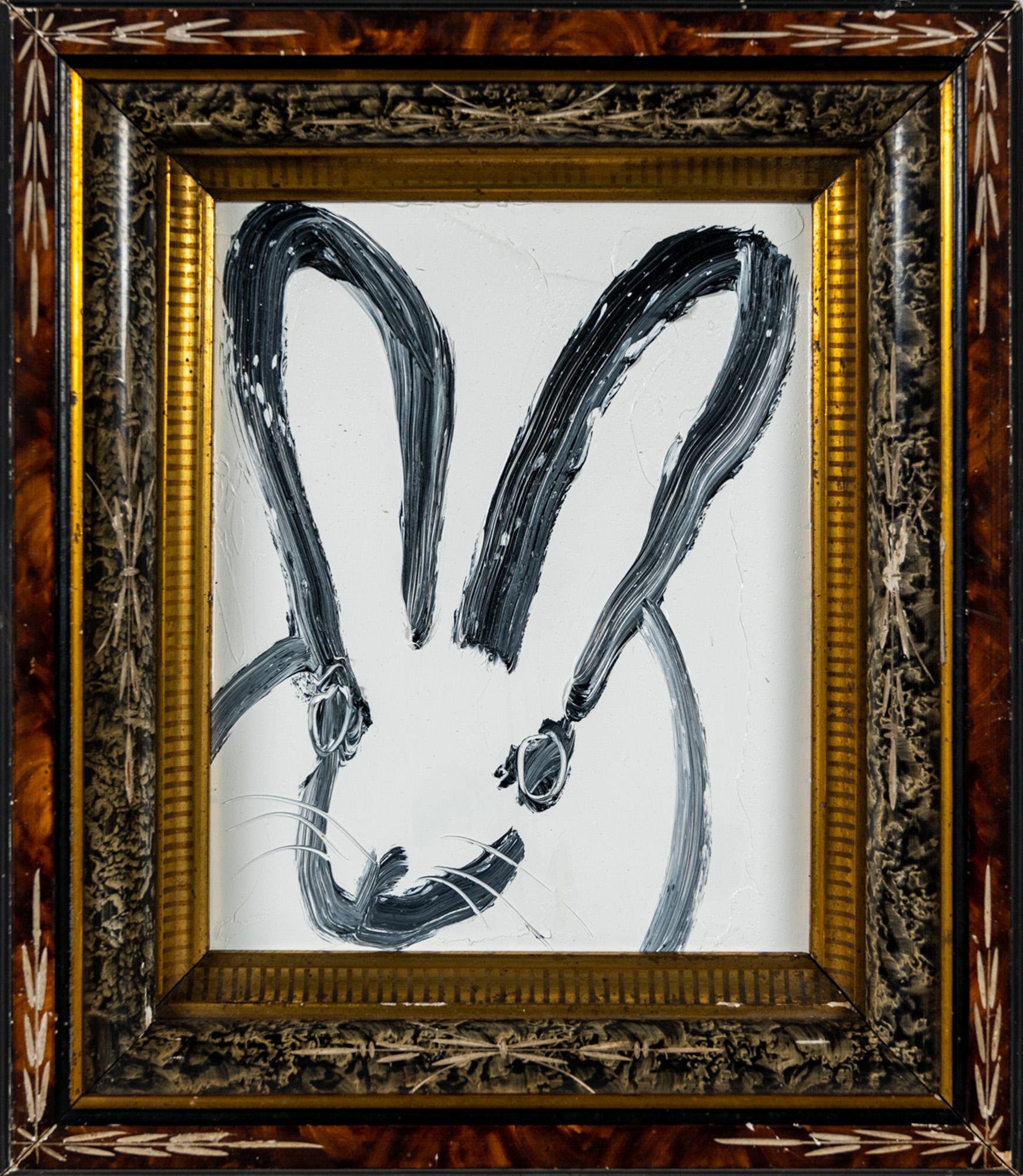 "Leroy" is a framed oil painting on wood by Hunt Slonem, depicting a lone rabbit in painterly contour lines set against a simple white background. 

This piece is finished in an antique frame, which has been hand-selected by the artist for this