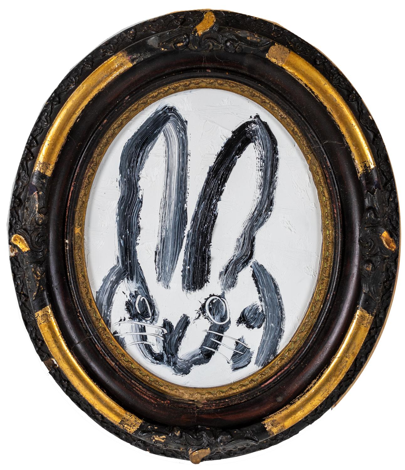 Hunt Slonem "Susanne" Spotted Bunny
Black outlined spotted bunny on a white background in an antique oval frame

Unframed: 10 x 8 inches  
Framed: 15 x 12.5 inches
*Painting is framed - Please note that not all Hunt Slonem frames are not in mint