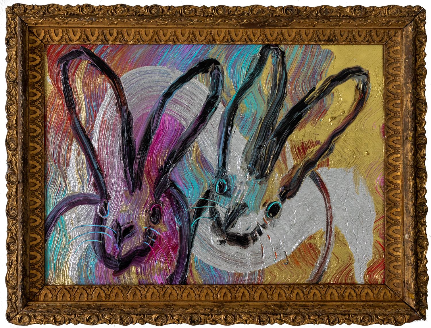 Hunt Slonem "Totem with Two" Metallic Rainbow Bunnies
Black outlined bunnies on a silver and gold metallic background in an antique frame

Unframed: 12.5 x 17.5 inches
Framed: 16 x 21 inches
*Painting is framed - Please note Hunt Slonem paintings