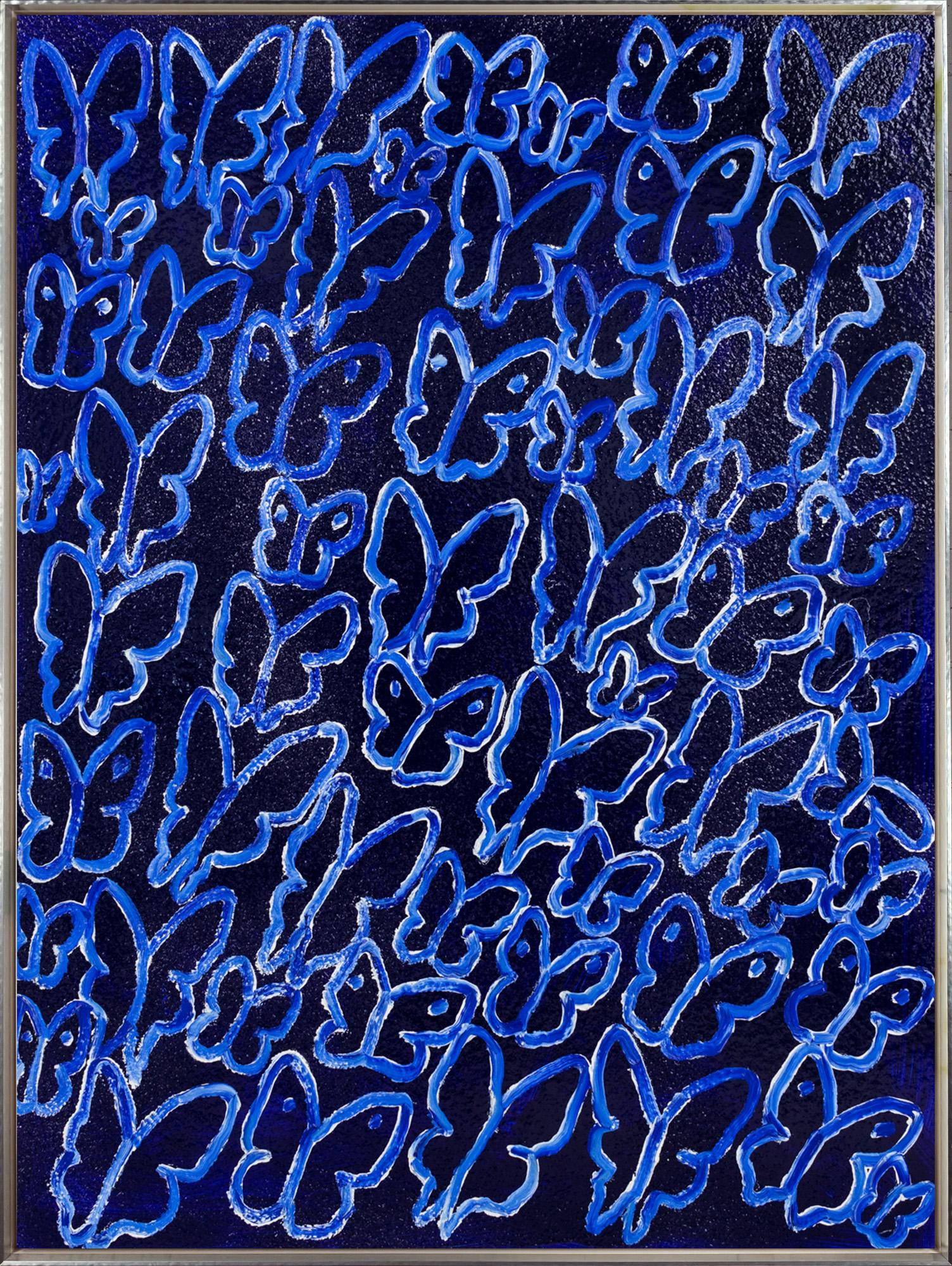 "Untitled" is a framed acrylic and oil painting on canvas by Hunt Slonem, depicting a flock of butterflies atop a deep blue Diamond Dust background. 

This piece is finished in a silver floater frame with subtle beveling and a white woodgrain effect
