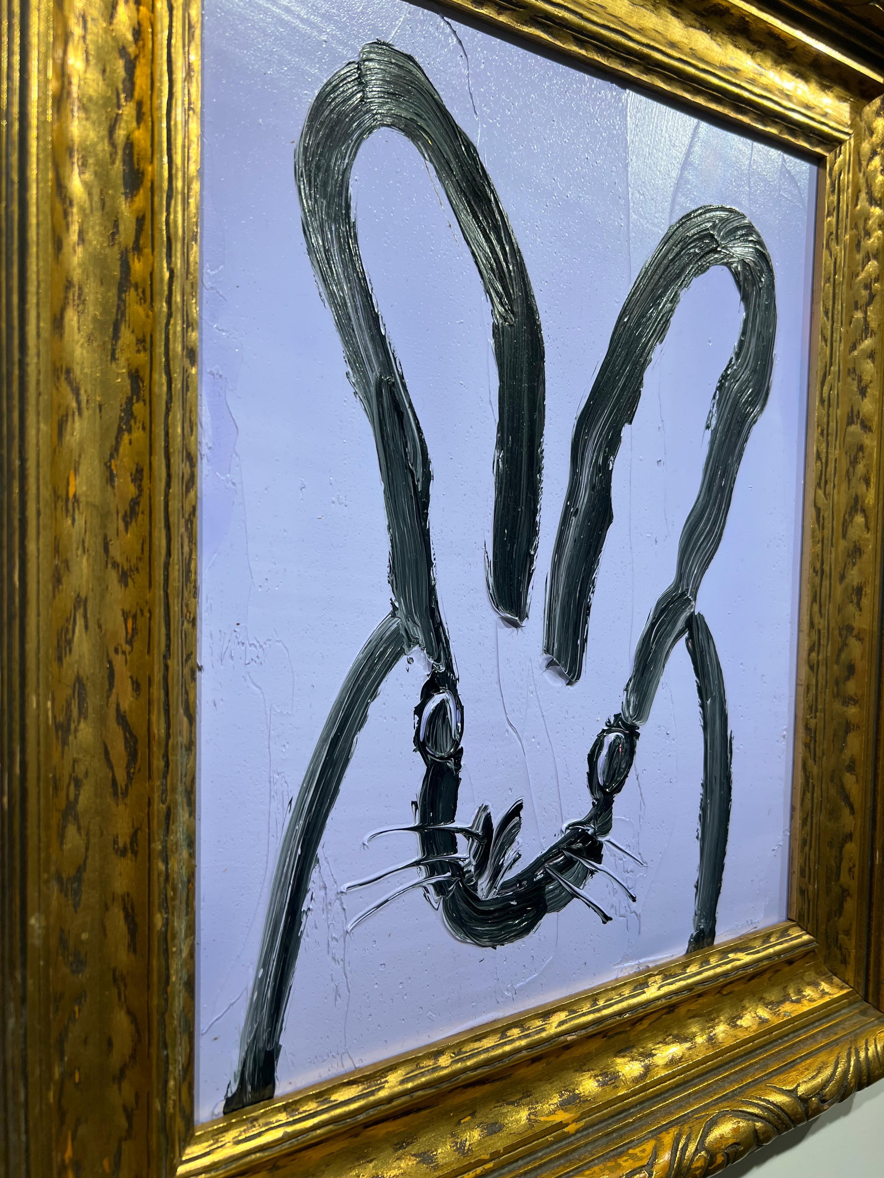 Original and unique artwork by Hunt Slonem.
Oil on wood, lavender bunny.

Painting is framed, as seen in the images. Dimensions of the artwork with the frame: 19 x 16.5 inches 
Signed Verso
Please note that Hunt Slonem paintings with frames may show