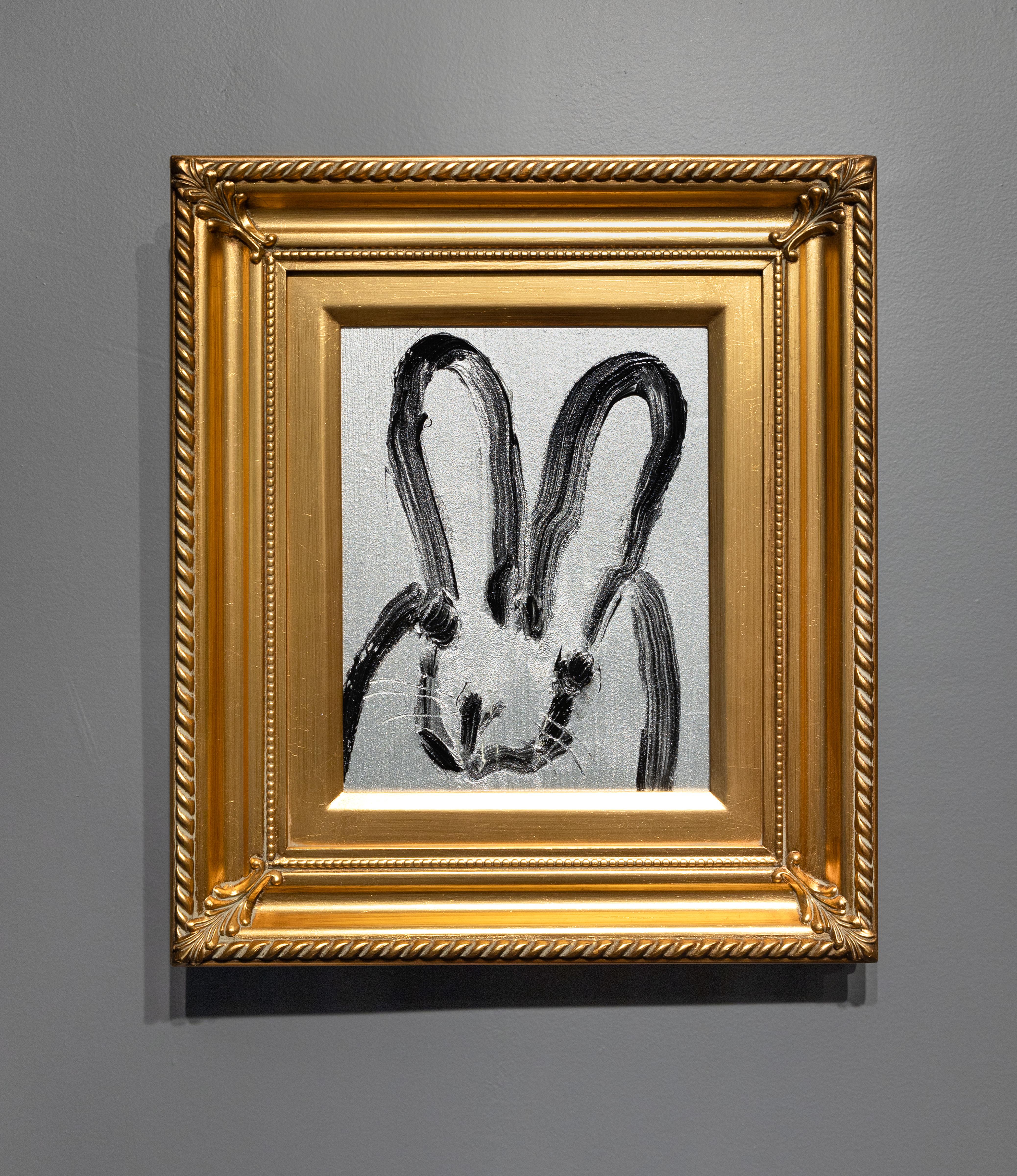 'Madewood' è un dipinto gestuale di Hunt Slonem. Il coniglietto gestuale si ritrova in tutto il corpus di opere neo-espressioniste di Slonem. Lo sfondo di questo quadro è argentato, in contrasto con la linea nera che definisce il coniglietto. Si