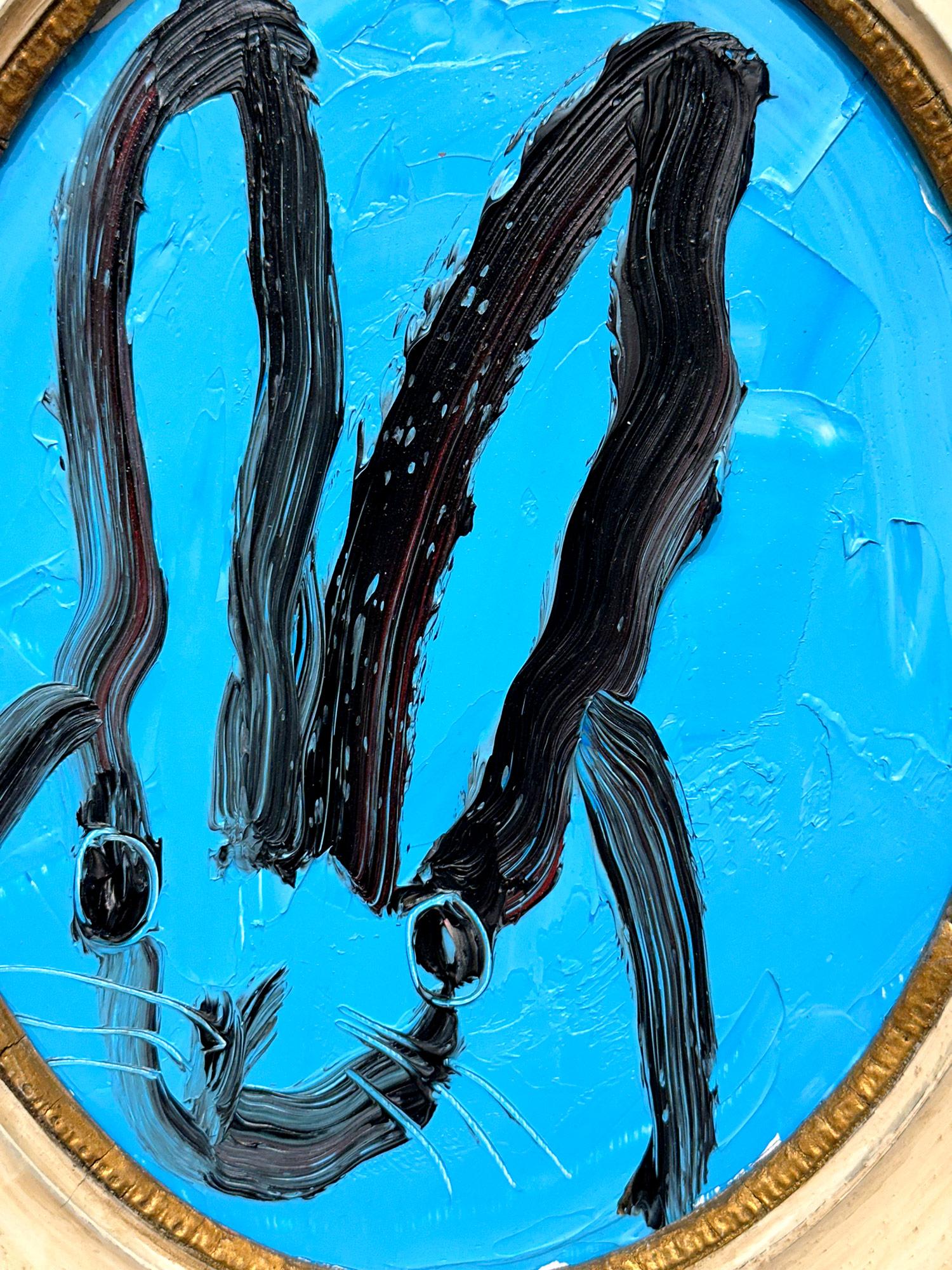 A wonderful composition of one of Slonem's most iconic subjects, Bunnies. This piece depicts a gestural figure of a black bunny on French Blue background with thick use of paint. It is housed in a wonderful antique frame. Inspired by nature and a