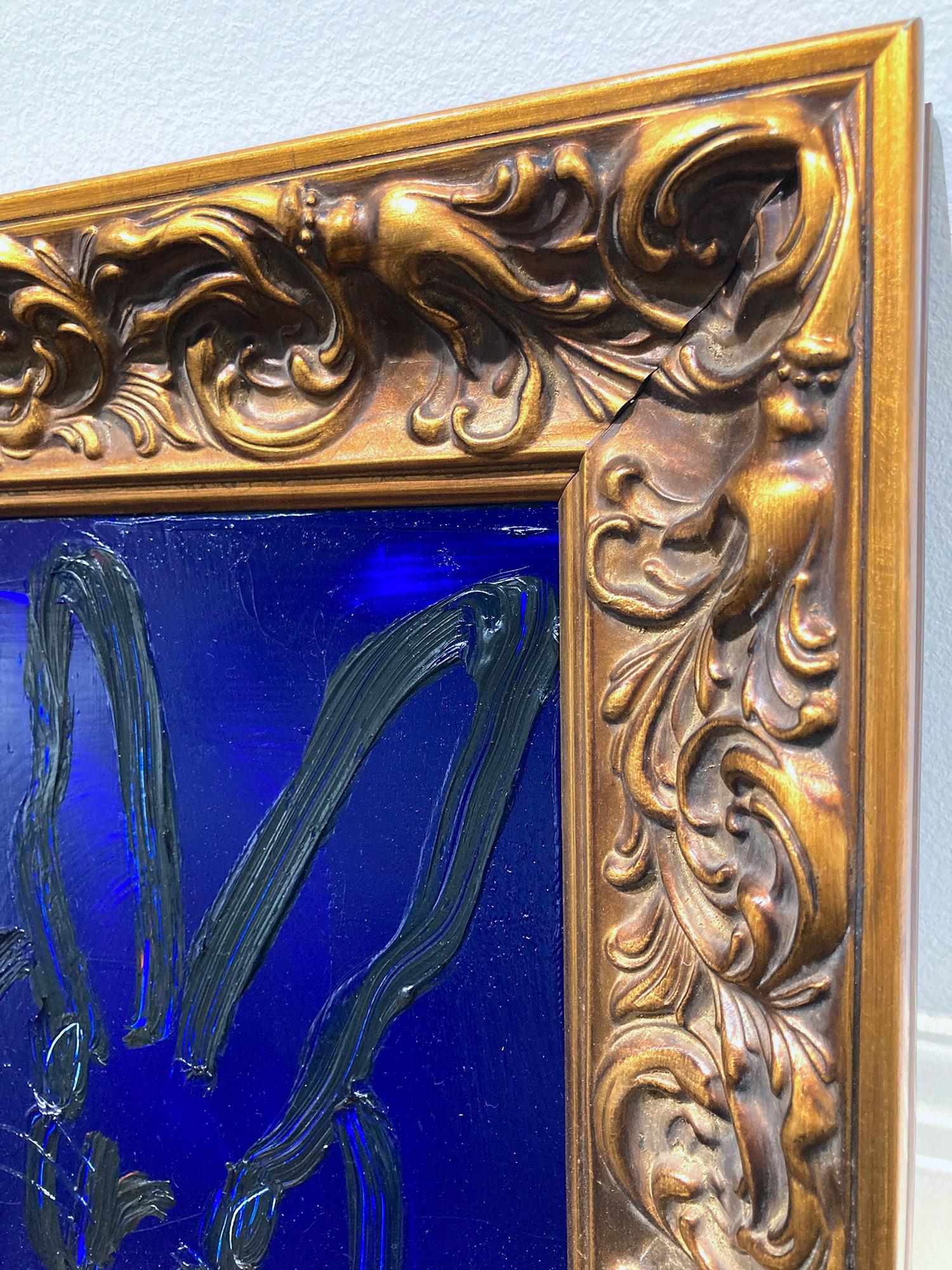 A wonderful composition of one of Slonem's most iconic subjects, Bunnies. This piece depicts a gestural figure of a black bunny on a Mid Night Blue background with thick use of paint. It is housed in a wonderful antique style wood frame. Inspired by