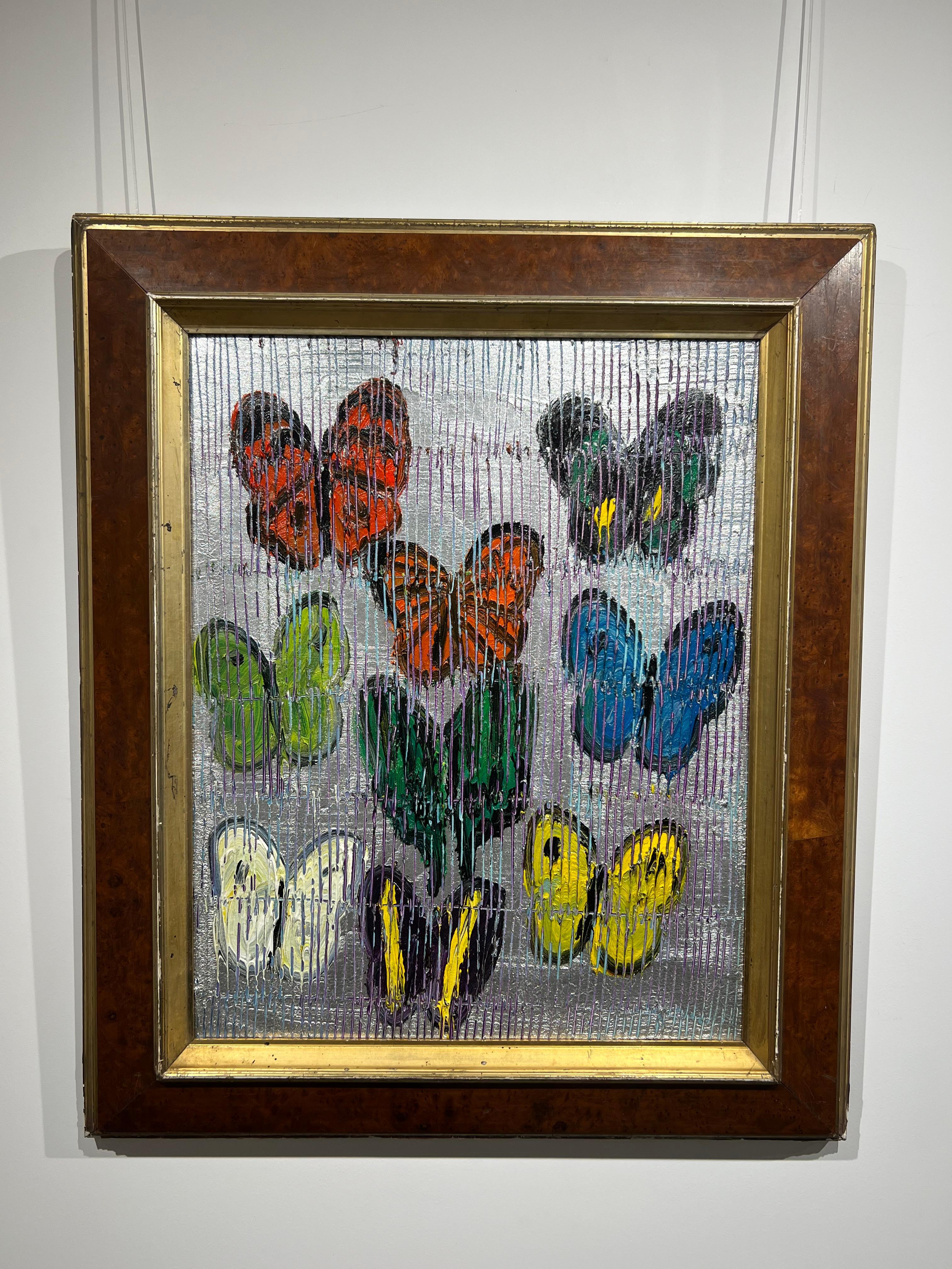 Original and unique artwork by Hunt Slonem.
Oil on wood
Green, red, yellow, purple, blue and multicolored multiple butterflies on a scored silver background
2024

Painting is framed, as seen in the images. Framed dimension 26 x 22 inches
Signed