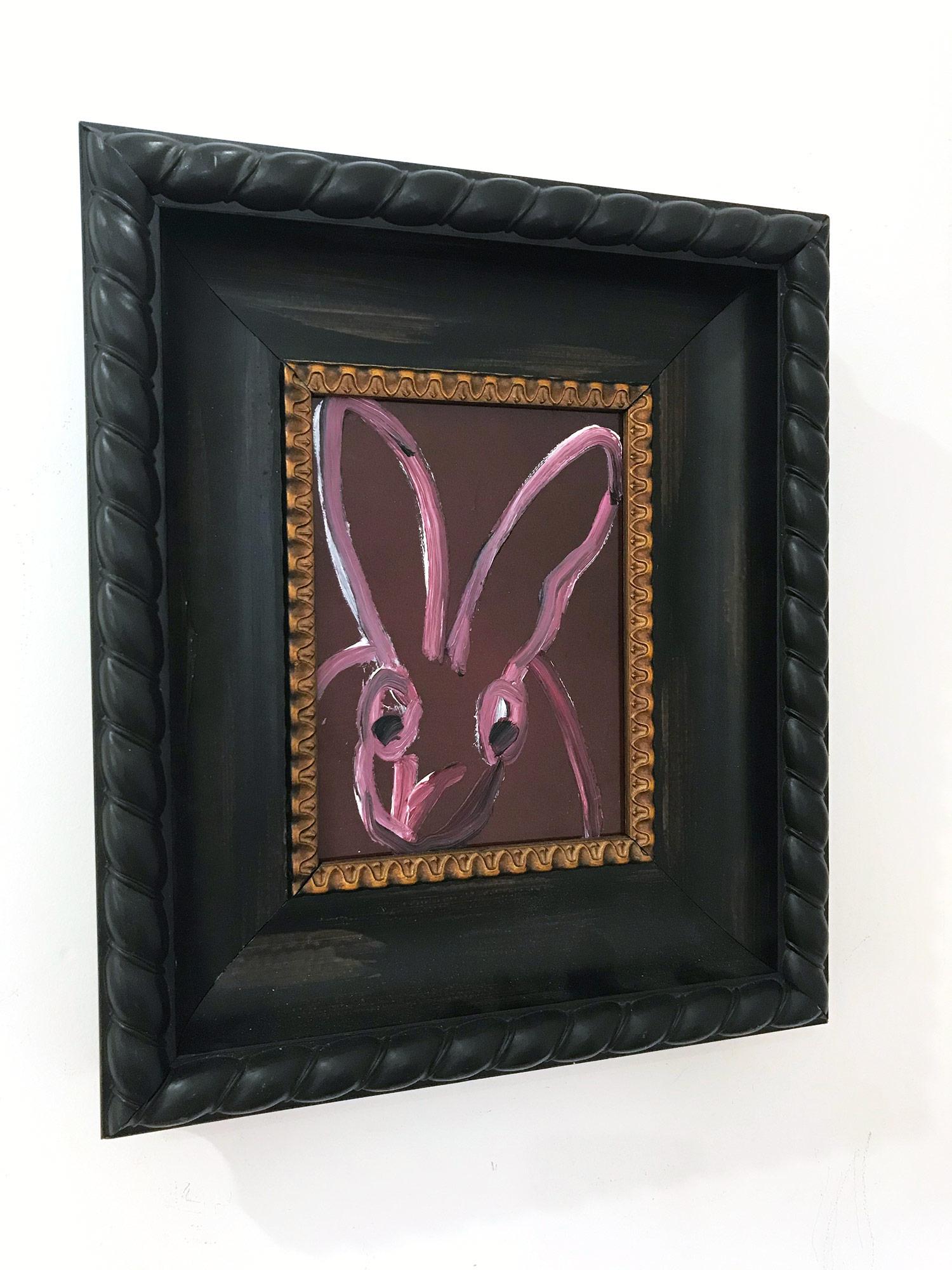 A wonderful composition of one of Slonem's most iconic subjects, Bunnies. This piece depicts a gestural figure of a black bunny on a Purple resin background with thick use of paint. It is housed in a wonderful Gothic Style frame. Inspired by nature