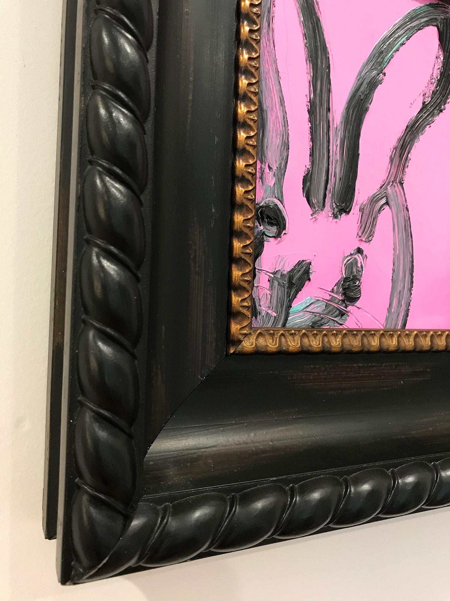 A wonderful composition of one of Slonem's most iconic subjects, Bunnies. This piece depicts a gestural figure of a black bunny on a Purple Lavendar background with thick use of paint. It is housed in a wonderful Gothic Style frame. Inspired by