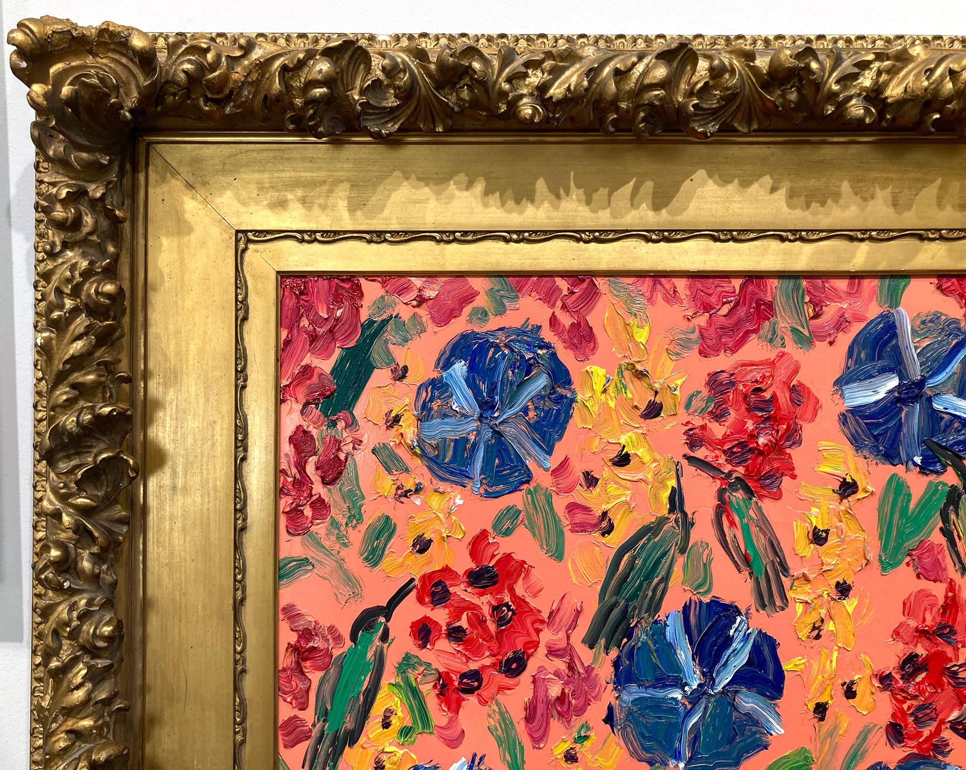 A wonderful composition Slonem's Hummingbirds. This piece depicts gestural figures of colorful Humming Birds on a light Coral Pink background with thick use of paint. It is housed in a wonderful antique gold frame. Inspired by nature and a genuine