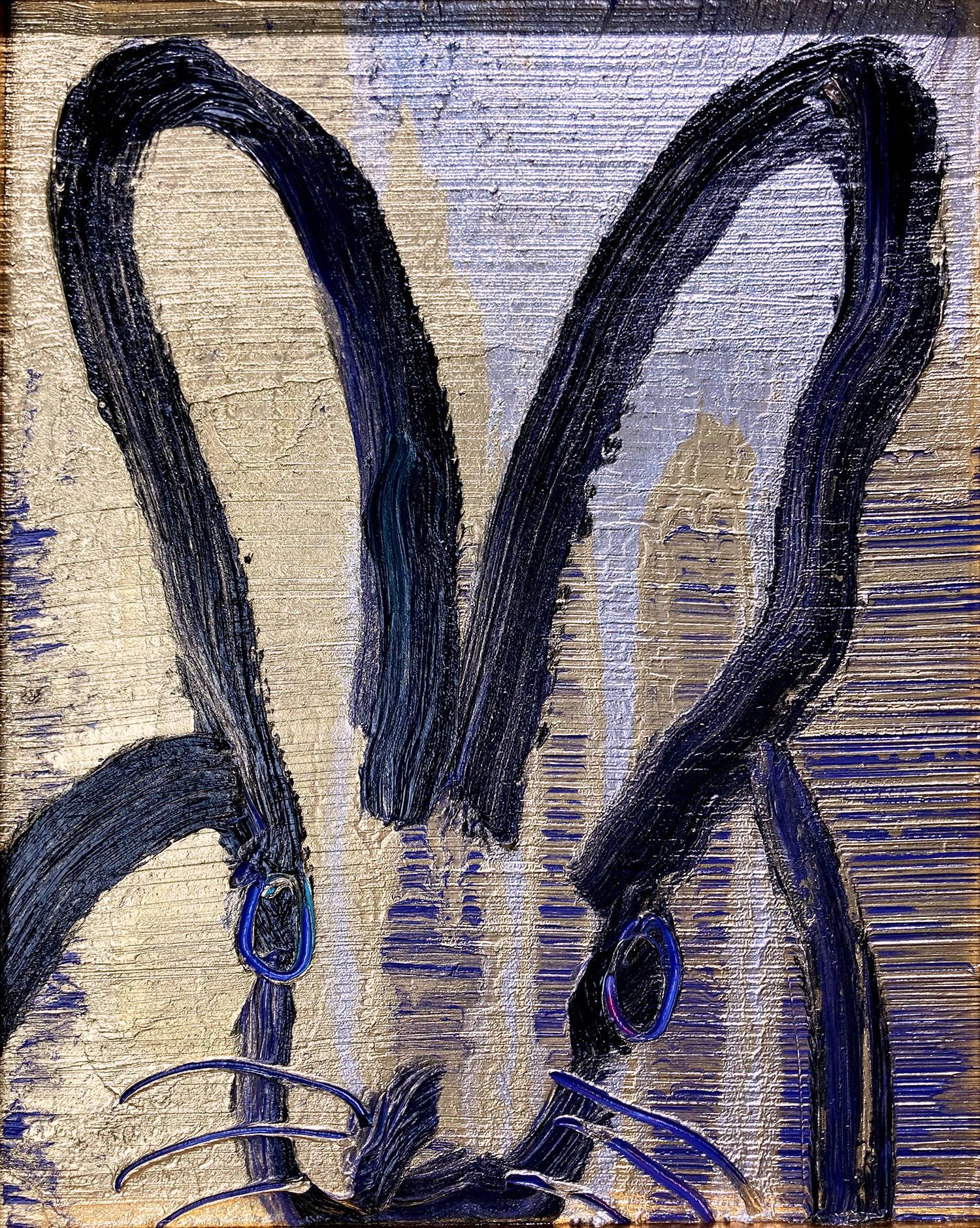 A wonderful composition of one of Slonem's most iconic subjects, Bunnies. This piece depicts a gestural figure of a black bunny on a Navy Blue, silver and Gold background with thick use of colorful paint. It is housed in a wonderful gold tone