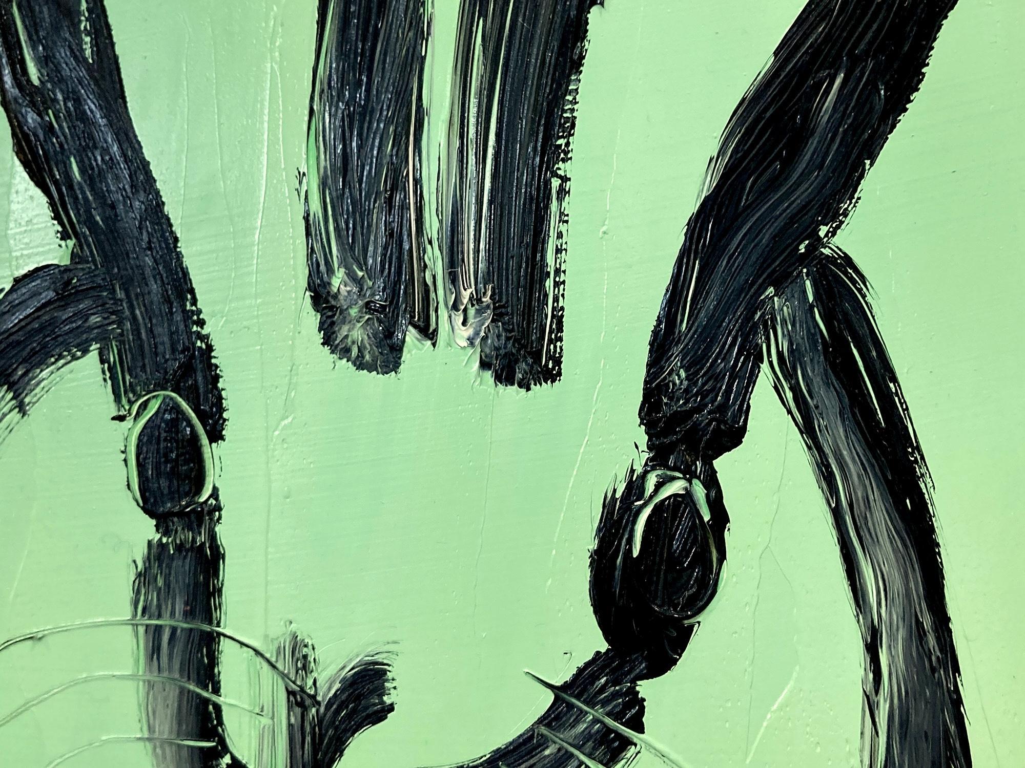 A wonderful composition of one of Slonem's most iconic subjects, Bunnies. This piece depicts a gestural figure of a black bunny on an Aqua blue background with thick use of paint. It is housed in a wonderful gold tone wood frame. Inspired by nature