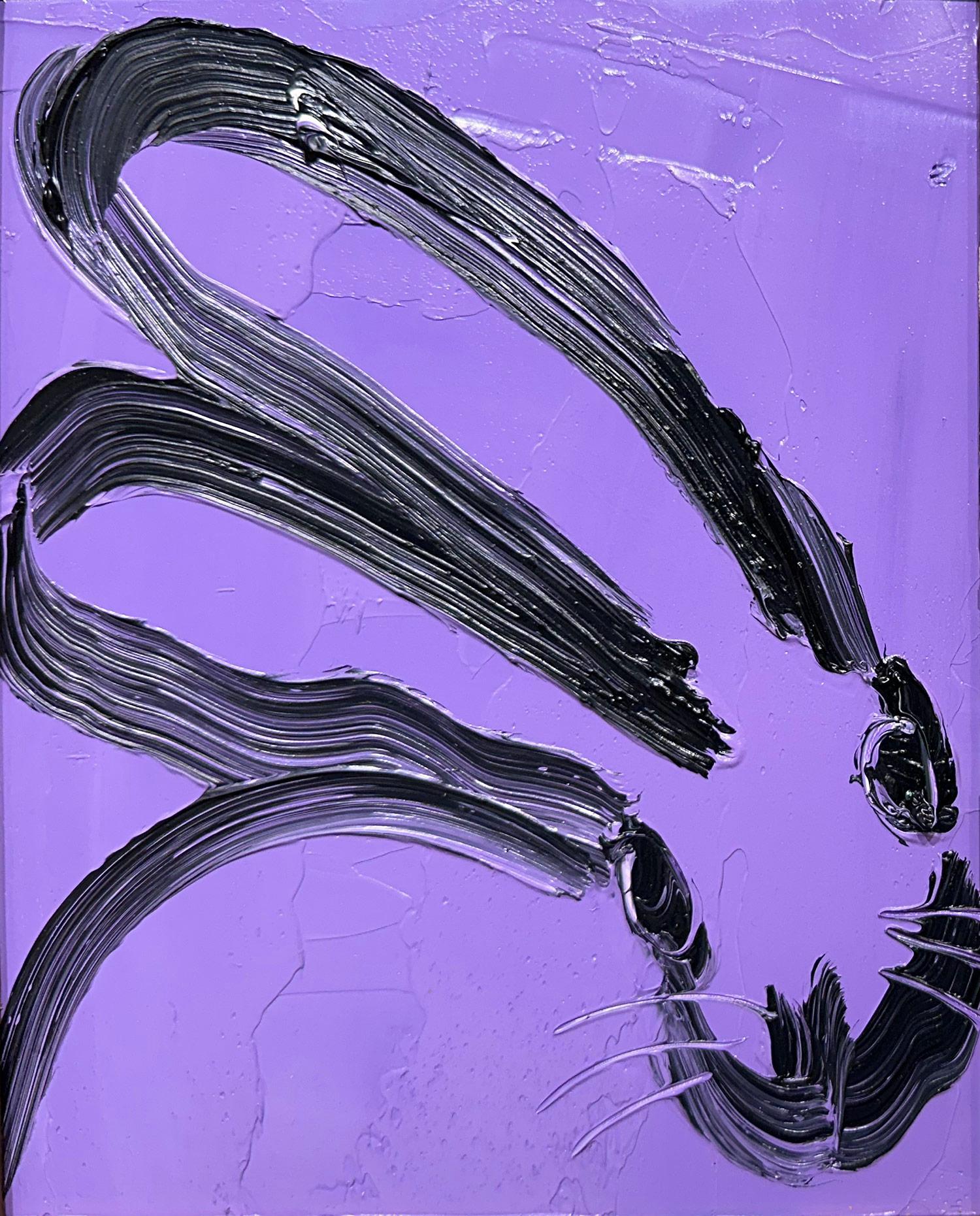 A wonderful composition of one of Slonem's most iconic subjects, Bunnies. This piece depicts a gestural figure of a black bunny on a Purple Lavender background with thick use of paint. It is housed in a wonderful black frame with silver details.