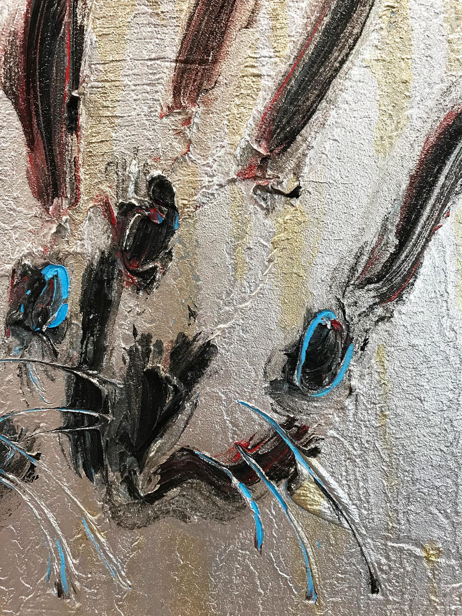 A wonderful composition of one of Slonem's most iconic subjects, Bunnies. This piece depicts gestural figures of 2 black, red and blue bunnies on a gold and silver background titled 