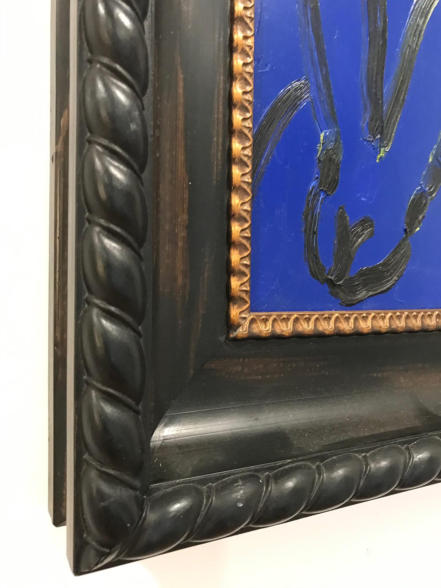 A wonderful composition of one of Slonem's most iconic subjects, Bunnies. This piece depicts a gestural figure of a black bunny on a Mid Night Blue background with thick use of paint. It is housed in a wonderful antique style Gothic wood frame.