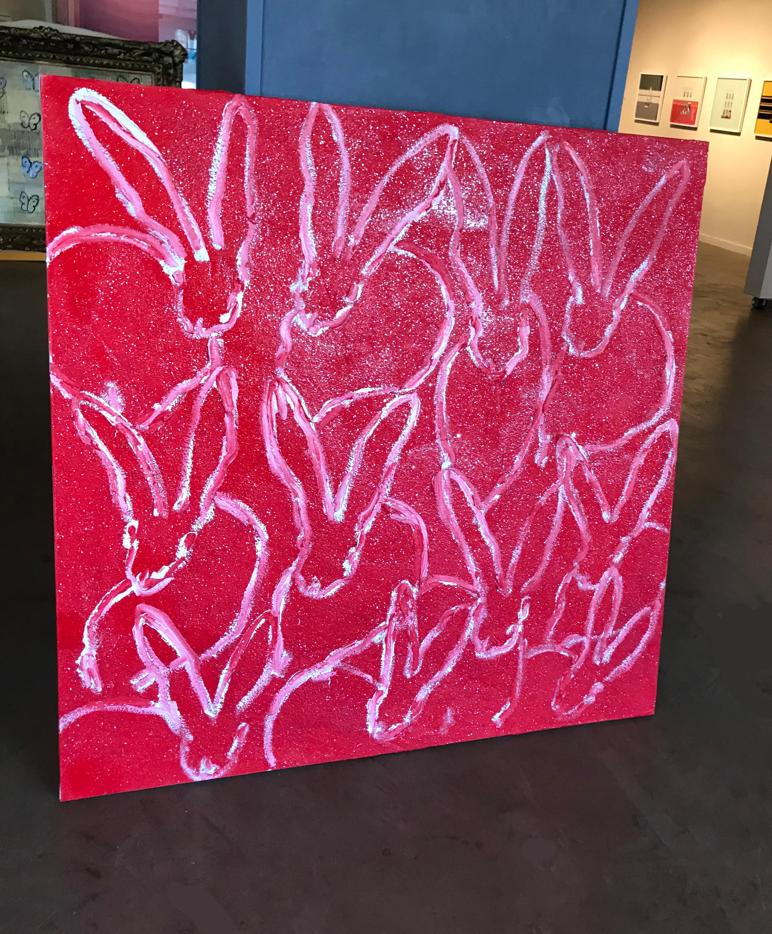 This Hunt Slonem red and white bunny painting with diamond dust captures the whimsical personalities of his gestural, neo-expressionist style. Unframed. 
New York painter, Hunt Slonem is best known for his Neo –Expressionist paintings of bunnies,