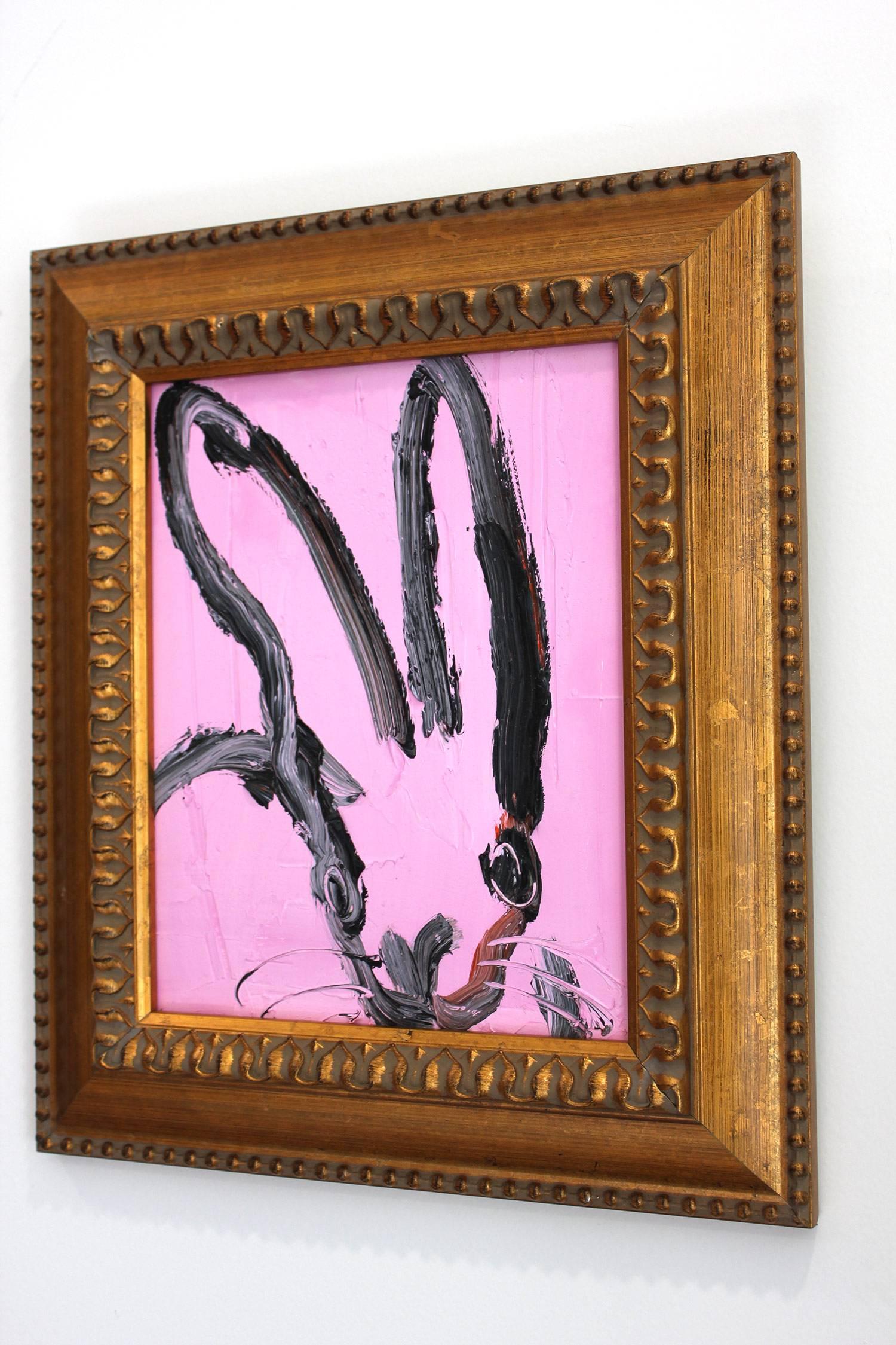 A wonderful composition of one of Slonem's most iconic subjects, Bunnies. This piece depicts a gestural figure of a black bunny on a Lavender background with thick use of paint. It is housed in a wonderful antique 19th Century frame. Inspired by