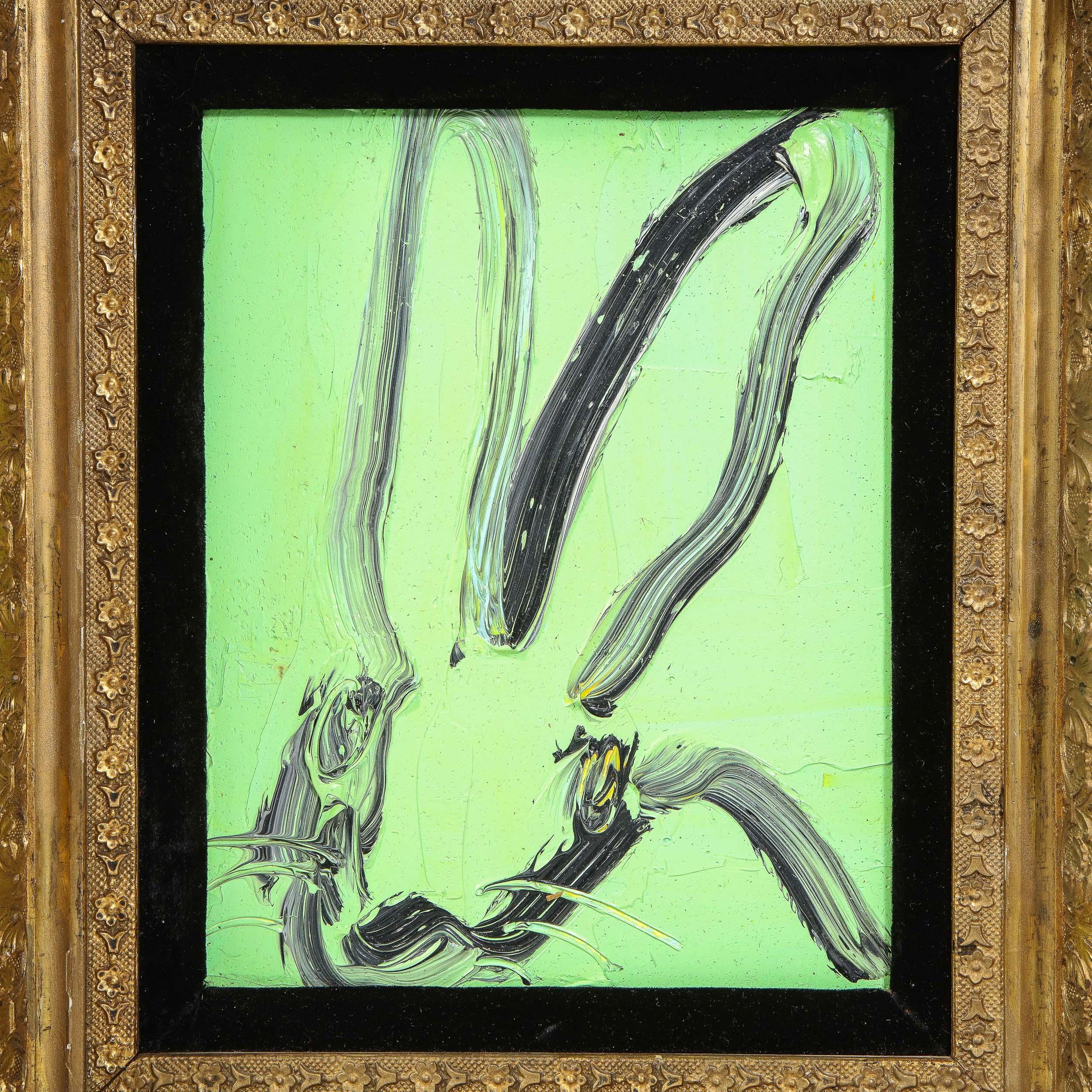 This whimsical and sophisticated painting was realized by the esteemed contemporary painter, Hunt Slonem in 2014. It presents a stylized bunny rabbit, rendered with loose and expressive brush strokes in black paint against a chartreuse background.