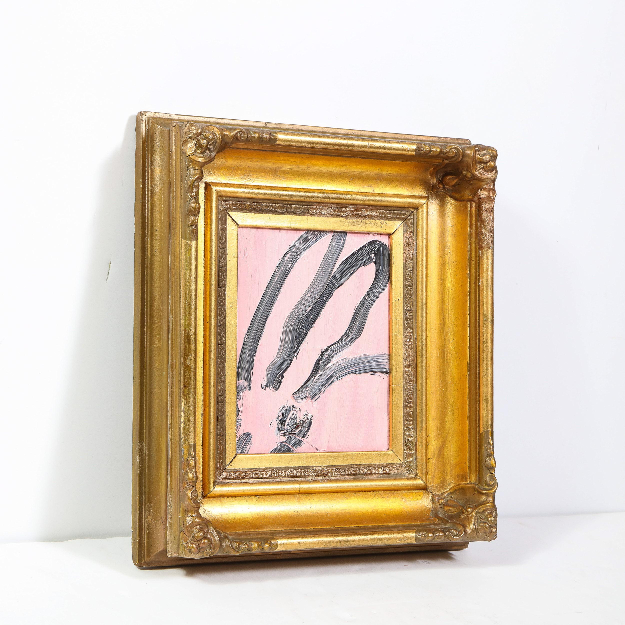 This whimsical and sophisticated painting was realized by the esteemed contemporary painter, Hunt Slonem in 2015. It presents a stylized bunny rabbit, rendered with loose and expressive brush strokes in black paint against a bubble gum pink