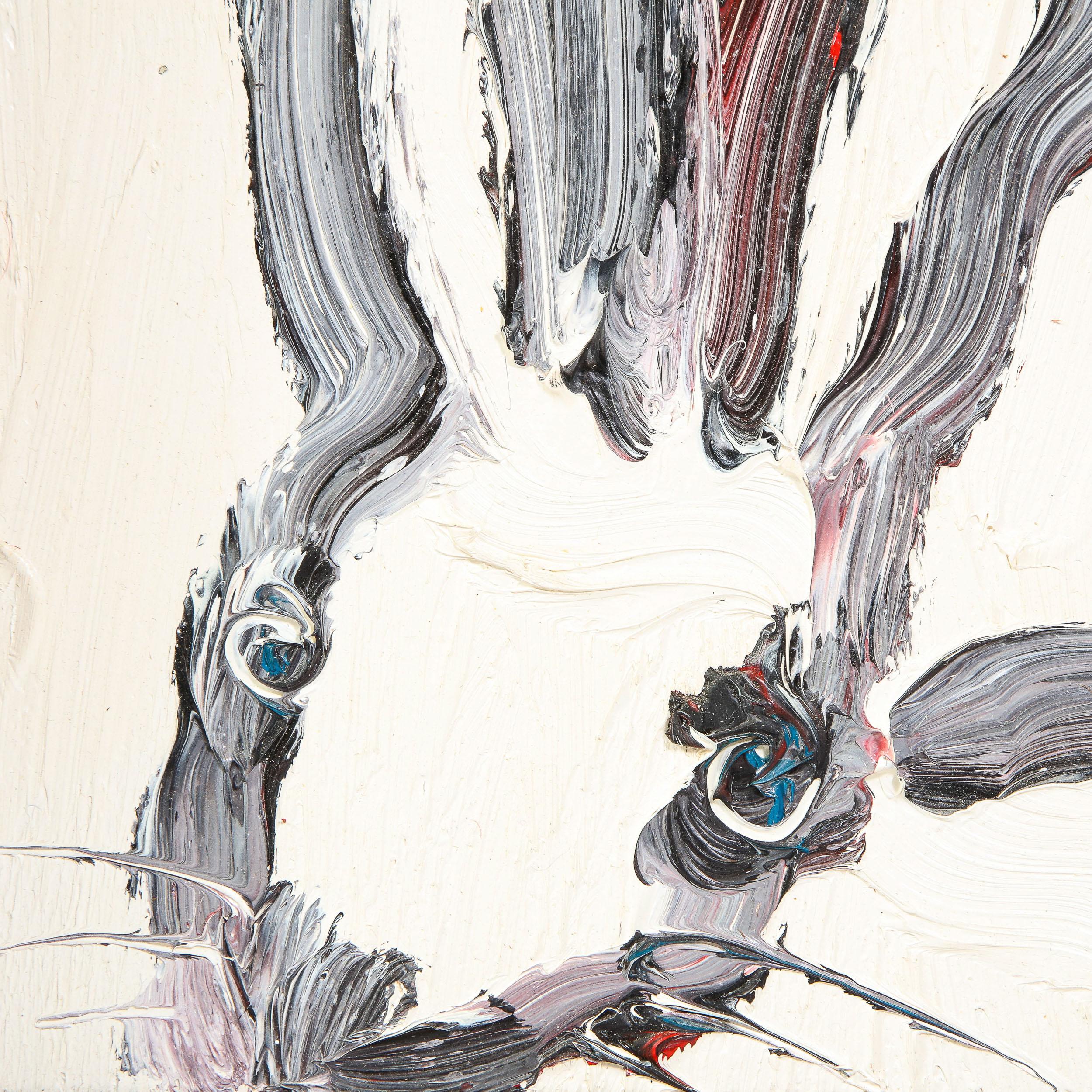 This whimsical and sophisticated painting was realized by the esteemed contemporary painter, Hunt Slonem in 2015. It presents a stylized bunny rabbit, rendered with loose and expressive brush strokes in black and white paint (with hints of carnelian