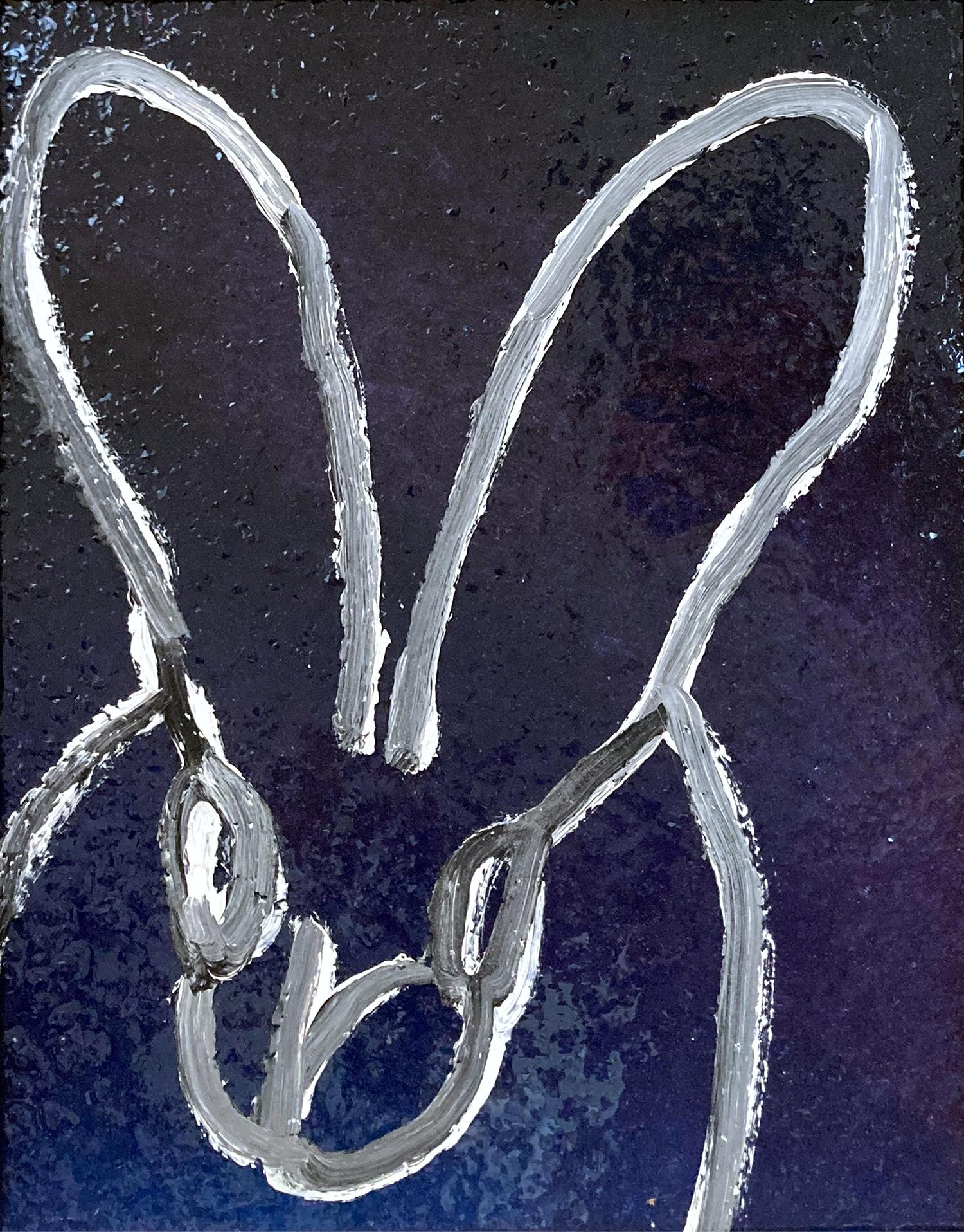 A wonderful composition of one of Slonem's most iconic subjects, Bunnies. This piece depicts a gestural figure of a white bunny on a black background with thick white paint and then encases the piece in diamond dust, which adds another level of