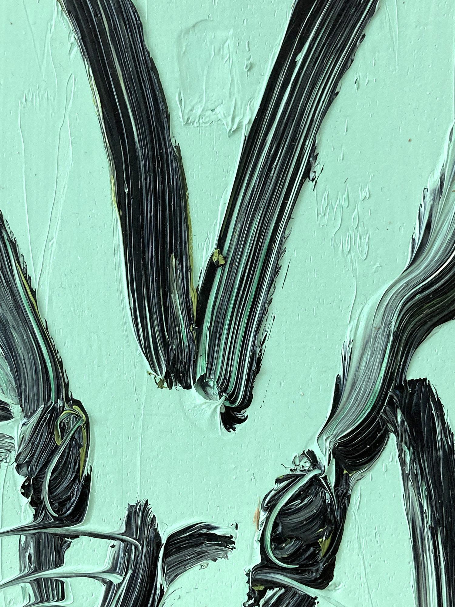 A wonderful composition of one of Slonem's most iconic subjects, Bunnies. This piece depicts a gestural figure of a black bunny on Belize Turquoise background with thick use of paint. It is housed in a wonderful antique gold frame. Inspired by