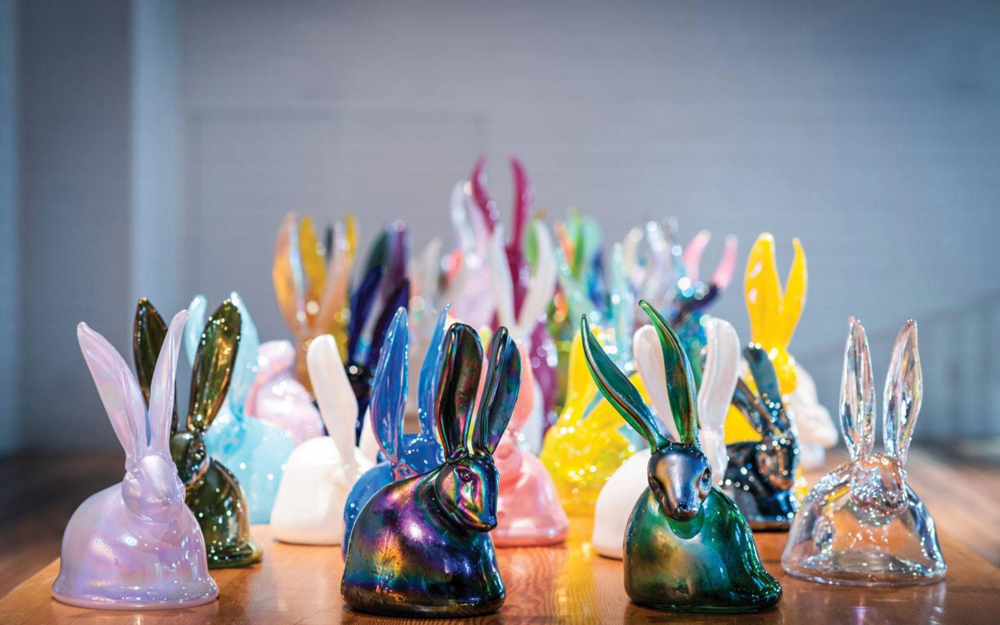 From canvas to kiln, Hunt Slonem brings his signature subject to life like never before. This wonderful hand-blown sculpture depicts one of Slonem's signature bunnies in an iridescent teal glass. Slonem’s new blown-glass sculptures are a sublime