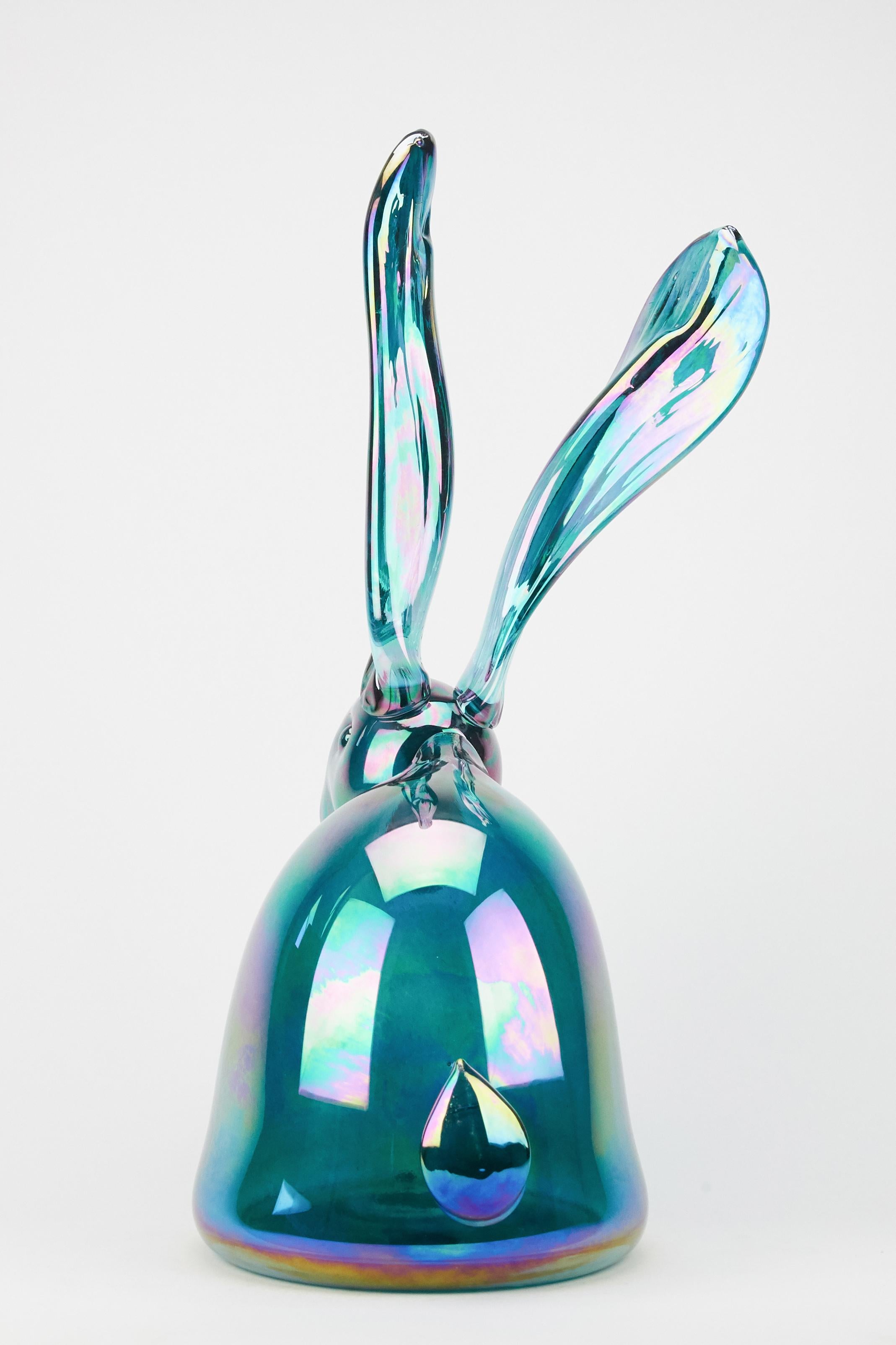From canvas to kiln, Hunt Slonem brings his signature subject to life like never before. This wonderful hand-blown sculpture depicts one of Slonem's signature bunnies in beautiful blue glass. Slonem’s new blown-glass sculptures are a sublime visual
