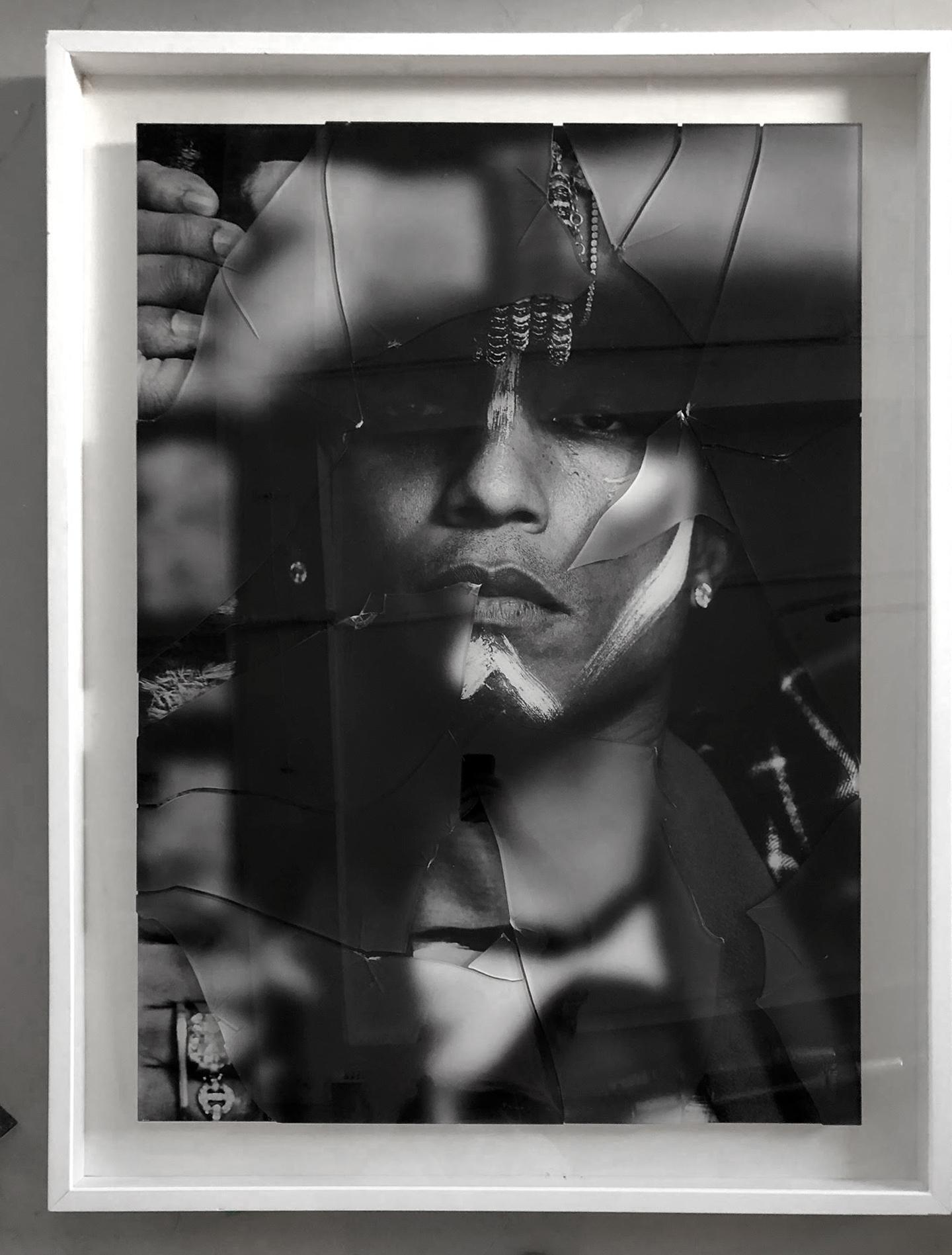 Pharrell Williams #3 and #4, (Diptych) by Hunter & Gatti
Black and White Photography with broken glass on top of the image.
Overall size: 
Image size: 45.2 in. H x 65 in. W
Frame size: 52.5 in. H x 78 in. W x 2 in. D

Individual size: 
Image size: