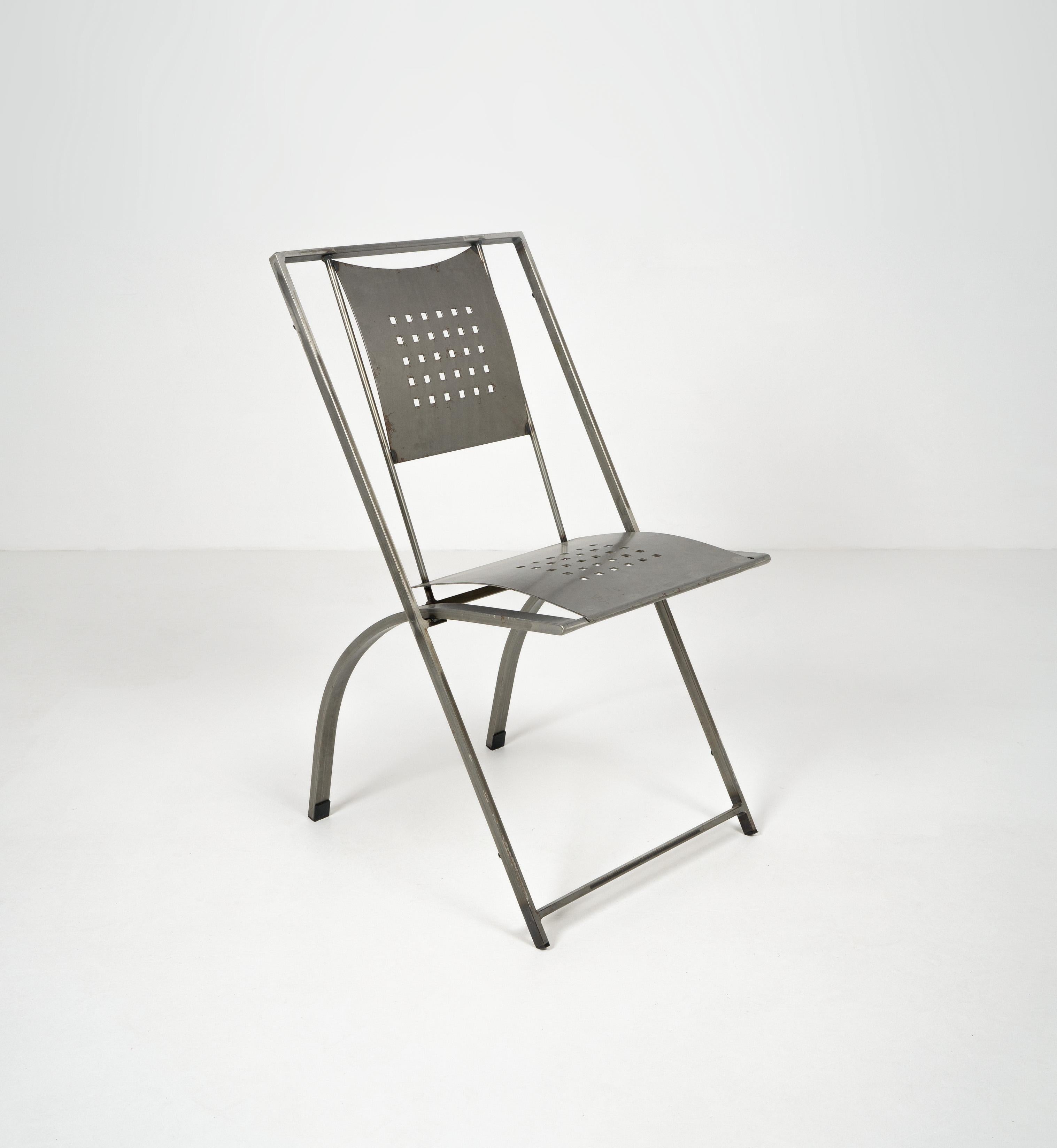 Postmodern industrial style ‘Hunter’ side chair,  designed by Karl Friedrich Förster and produced by KFF, c.1980

Dimensions (cm, approx):
Height: 88
Width: 55
Depth: 55

In good vintage condition with various surface imperfections as pictured.  
