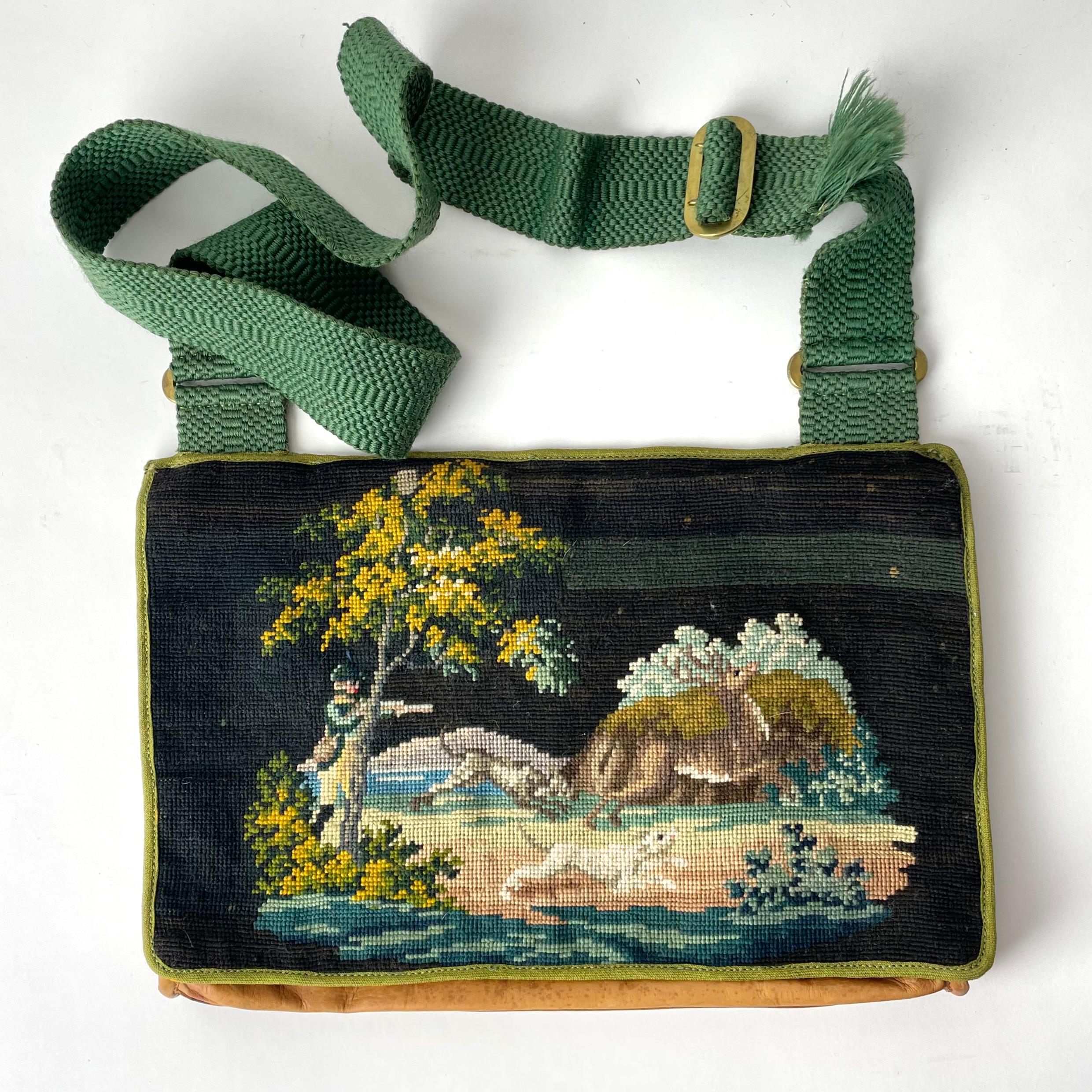 A beautiful Hunting Bag in leather with Petit Point decor from a hunting scene. Made during the 19th Century and inside with pockets for cartridges.

Wear consistent with age and use 