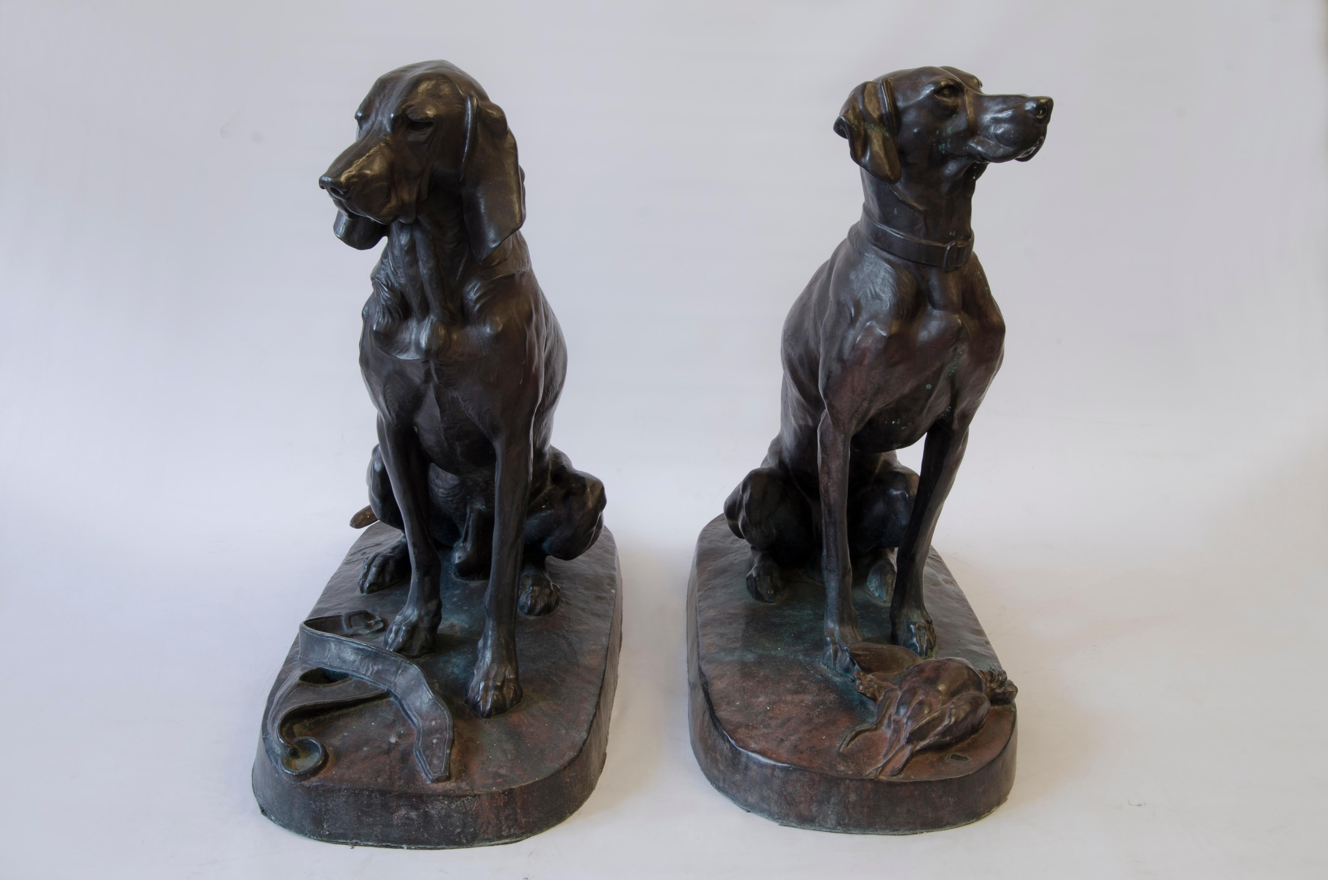 Pair of patinated bronze sculptures 