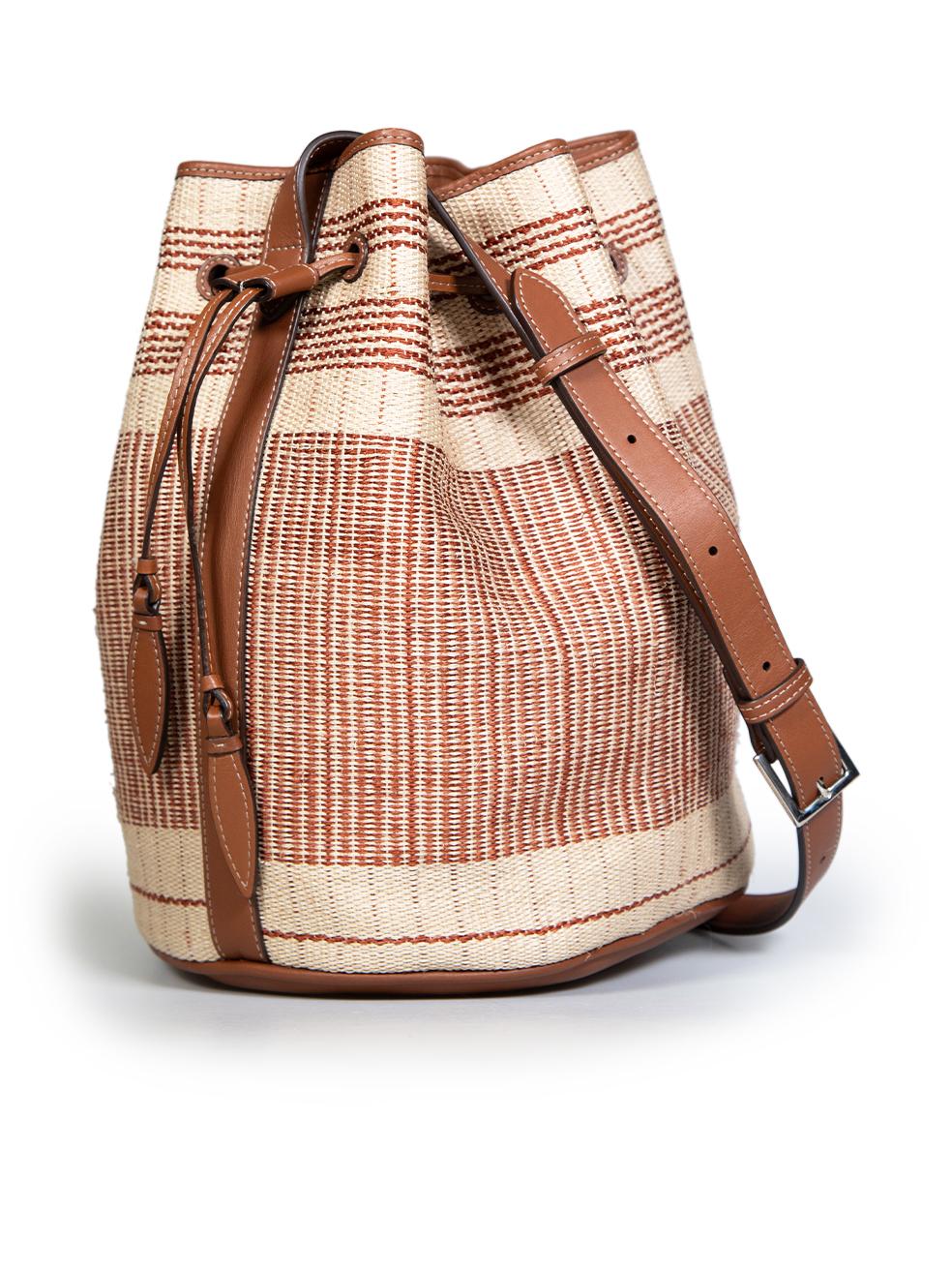 CONDITION is Very good. Hardly any visible wear to bag is evident on this used Hunting Season designer resale item. The item comes with a dust bag.
 
 
 
 Details
 
 
 Beige
 
 Wicker
 
 Bucket bag
 
 Brown striped pattern
 
 Brown leather trim
 
