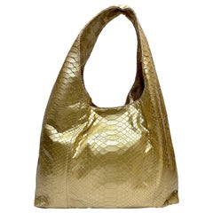 Hunting Season Borsa grande in pitone metallizzato oro