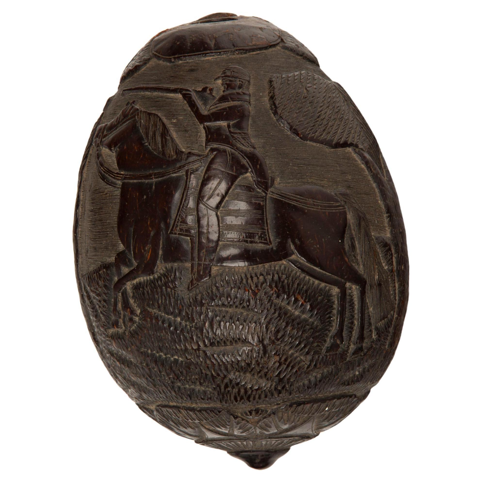 Hunting Tales: Rare 19th-Century French Colonial Carved Coconut Bugbear Flask