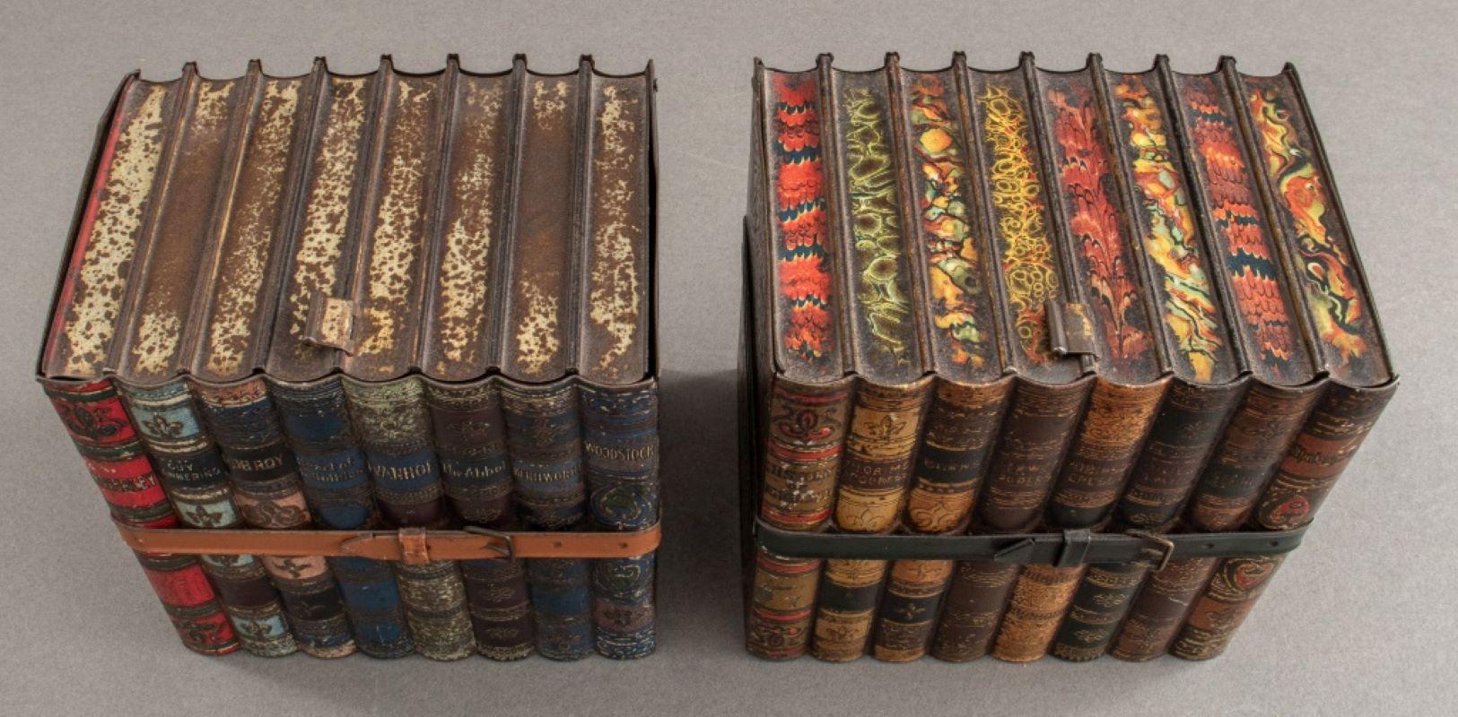 Antique Huntley & Palmers book-form biscuit tins, ca. 1901, two (2) each in the form of a stack of books held by a strap.  6.5