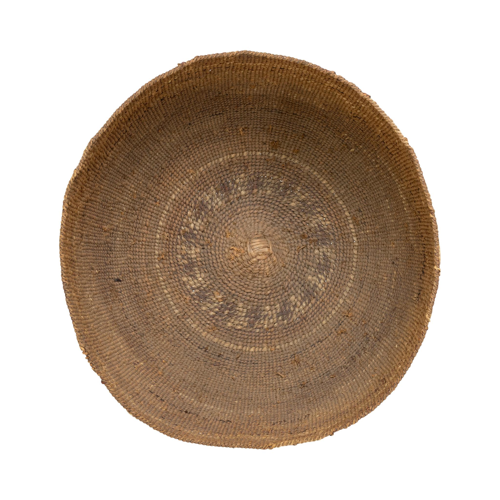 Hupa/Yurok polychrome basketry hat with imbricated dark brown banded stripe and red geometric motifs, band below rim and at base. 3.875