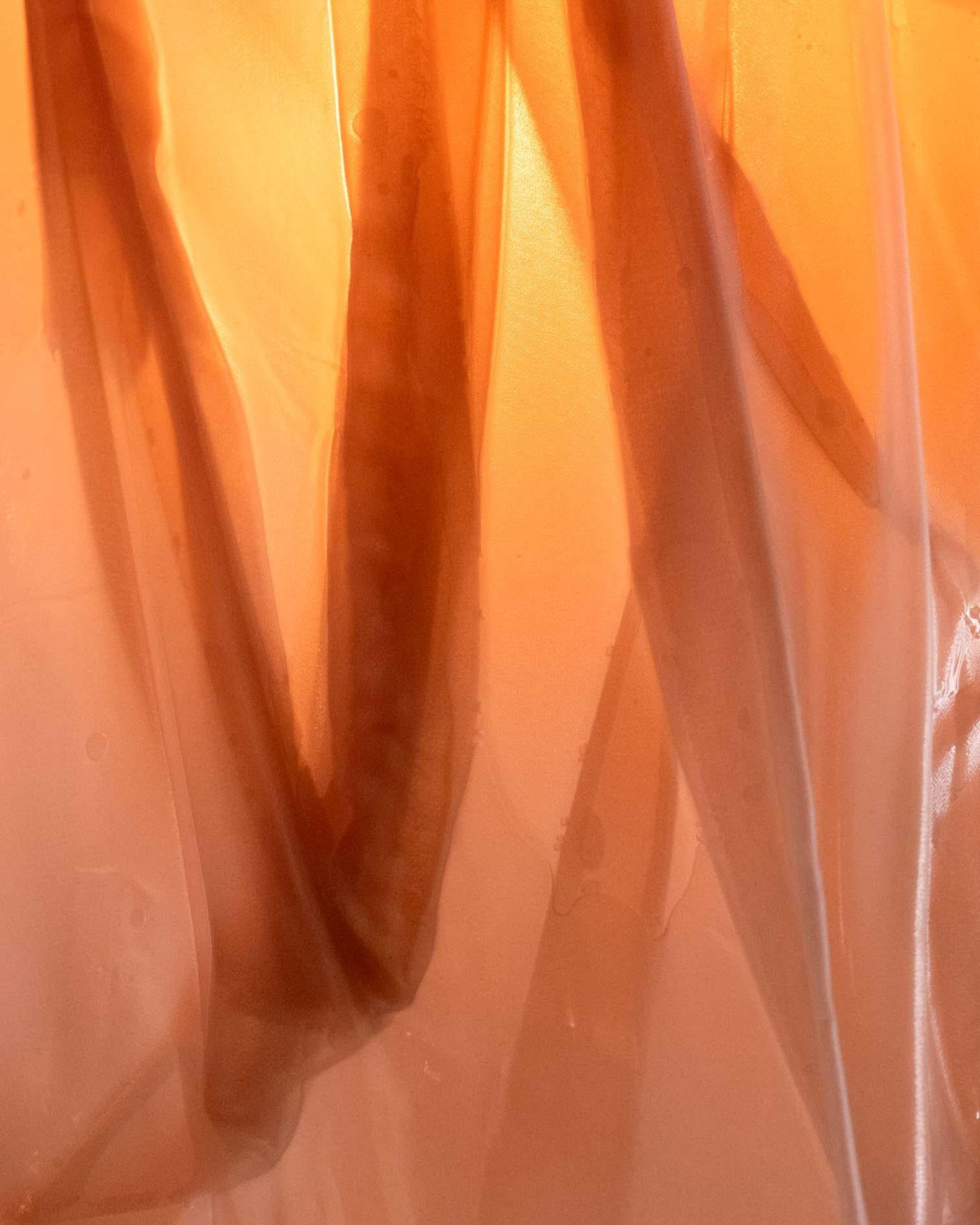 The Husk Light is a sculptural fixture made from transparent acrylic, hand-dyed with coffee and molded in resin. It casts a warm, natural glow and brings a soft, organic feel to any space. Inspired by husks and cocoons, it blends texture, light, and
