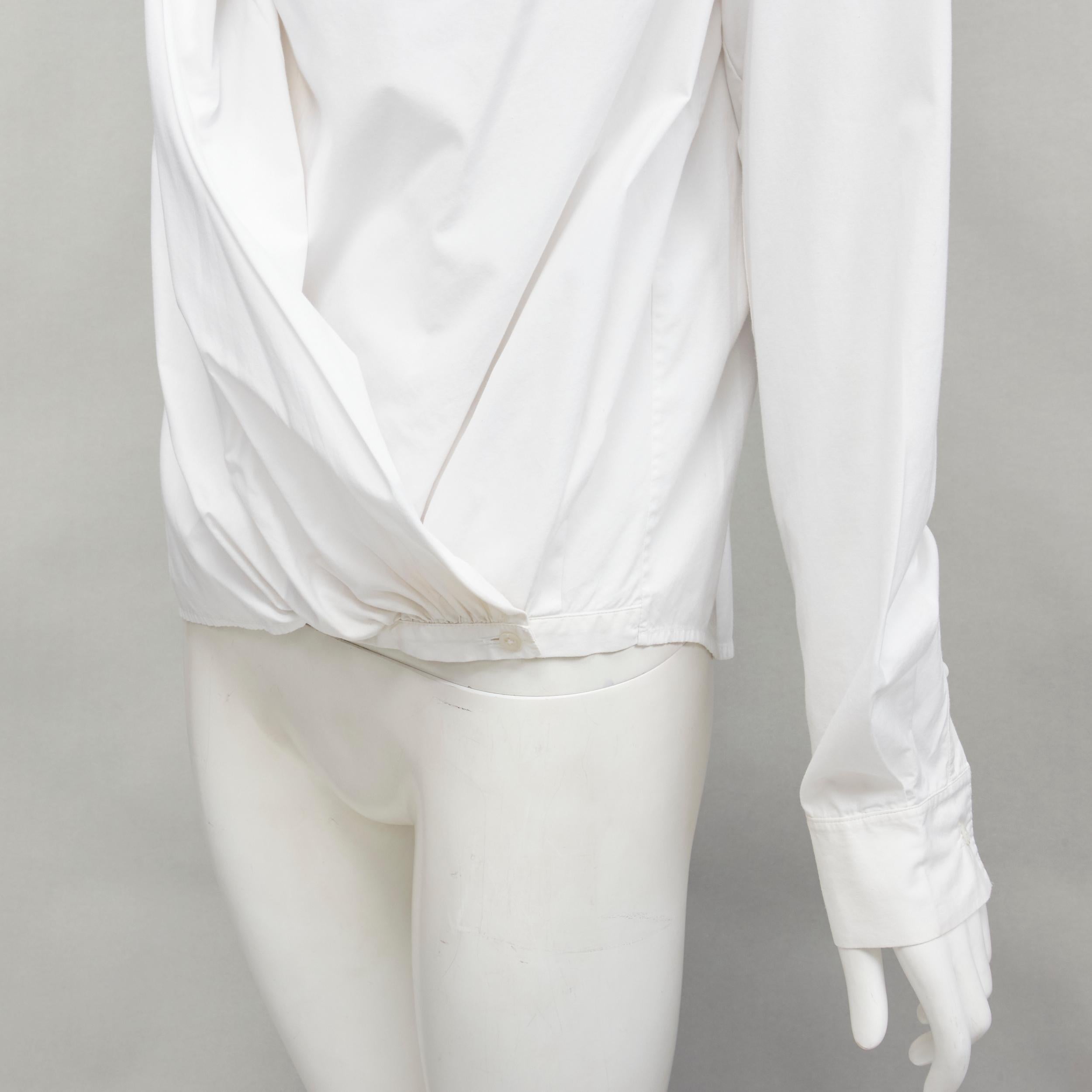 HUSSEIN CHALAYAN white cotton drape asymmetric collar back yoke shirt IT38 XS
Reference: YNWG/A00123
Brand: Hussein Chalayan
Material: Cotton
Color: White
Pattern: Solid
Closure: Button
Made in: China

CONDITION:
Condition: Good, this item was