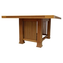 Husser 615 dining table by Frank Lloyd Wright produced by Cassina