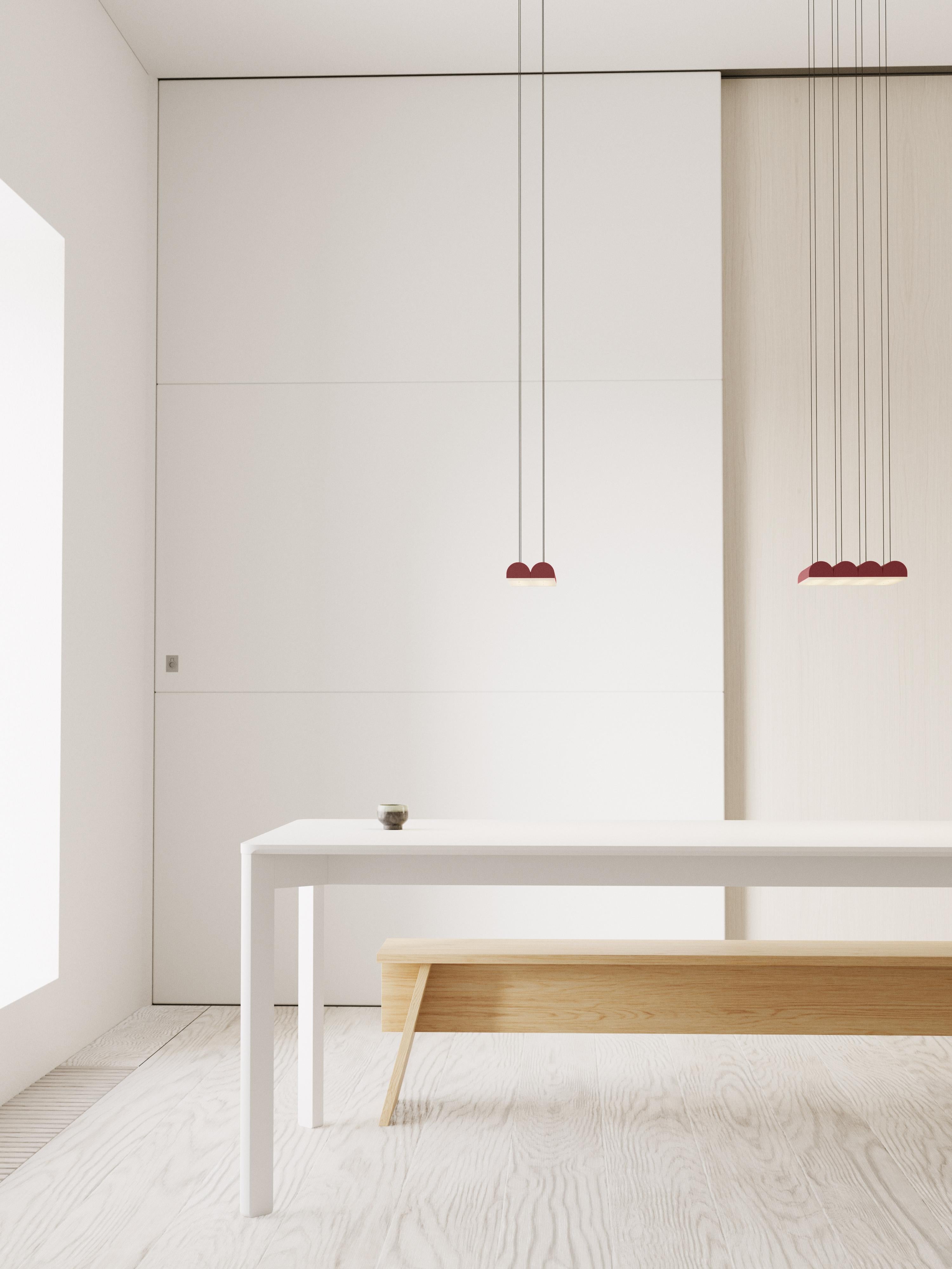 Hutchison is the thoughtful study of soft curves and hard lines, a rivalry of vertical and horizontal forces and a play of scale and repetition. Alone, it self-defines as a frank, decorative pendant light. In multiples, it evokes the iconic patterns