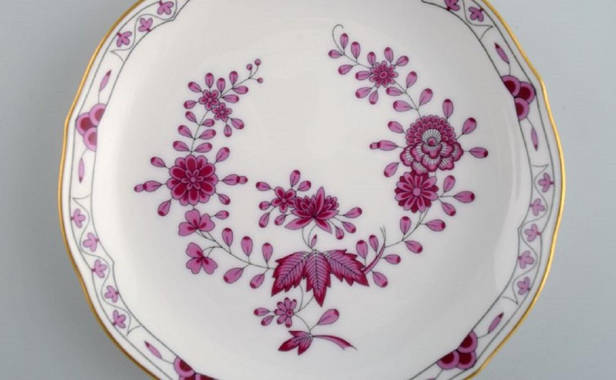 Hand-Painted Hutschenreuther, Germany. Three plates and two bowls in openwork porcelain. For Sale